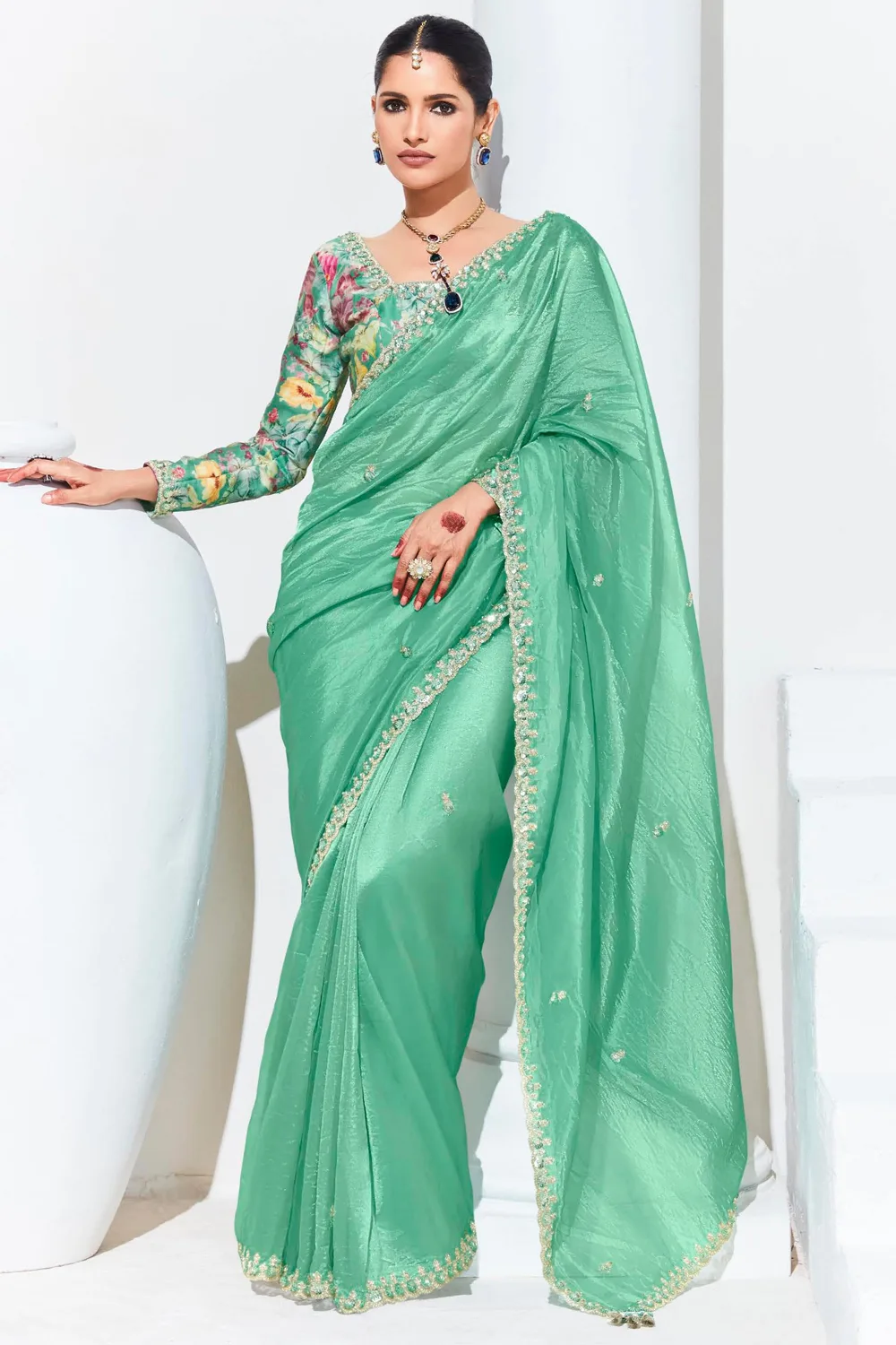 Graceful Green Organza Saree with Floral Fancy Blouse Graceful Green Organza Saree with Floral Fancy Blouse