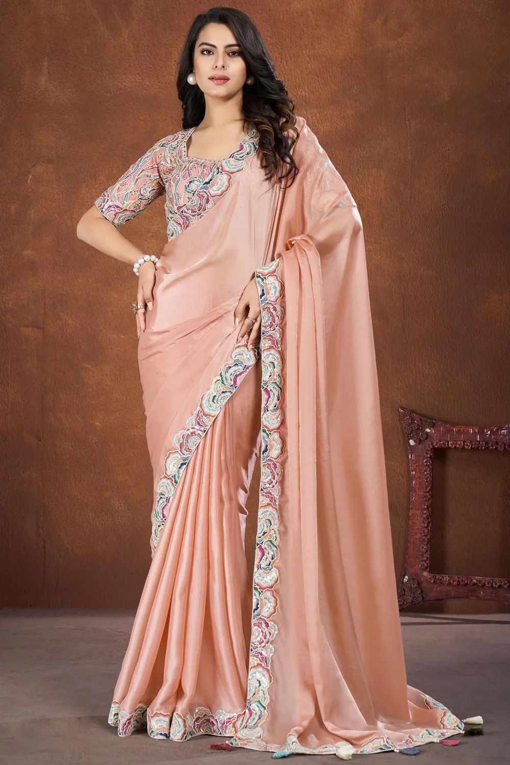 Peach-Colored Crepe Satin Silk Fancy Saree with Thread and Sequence Embroidered Peach-Colored Crepe Satin Silk Fancy Saree with Thread and Sequence Embroidered