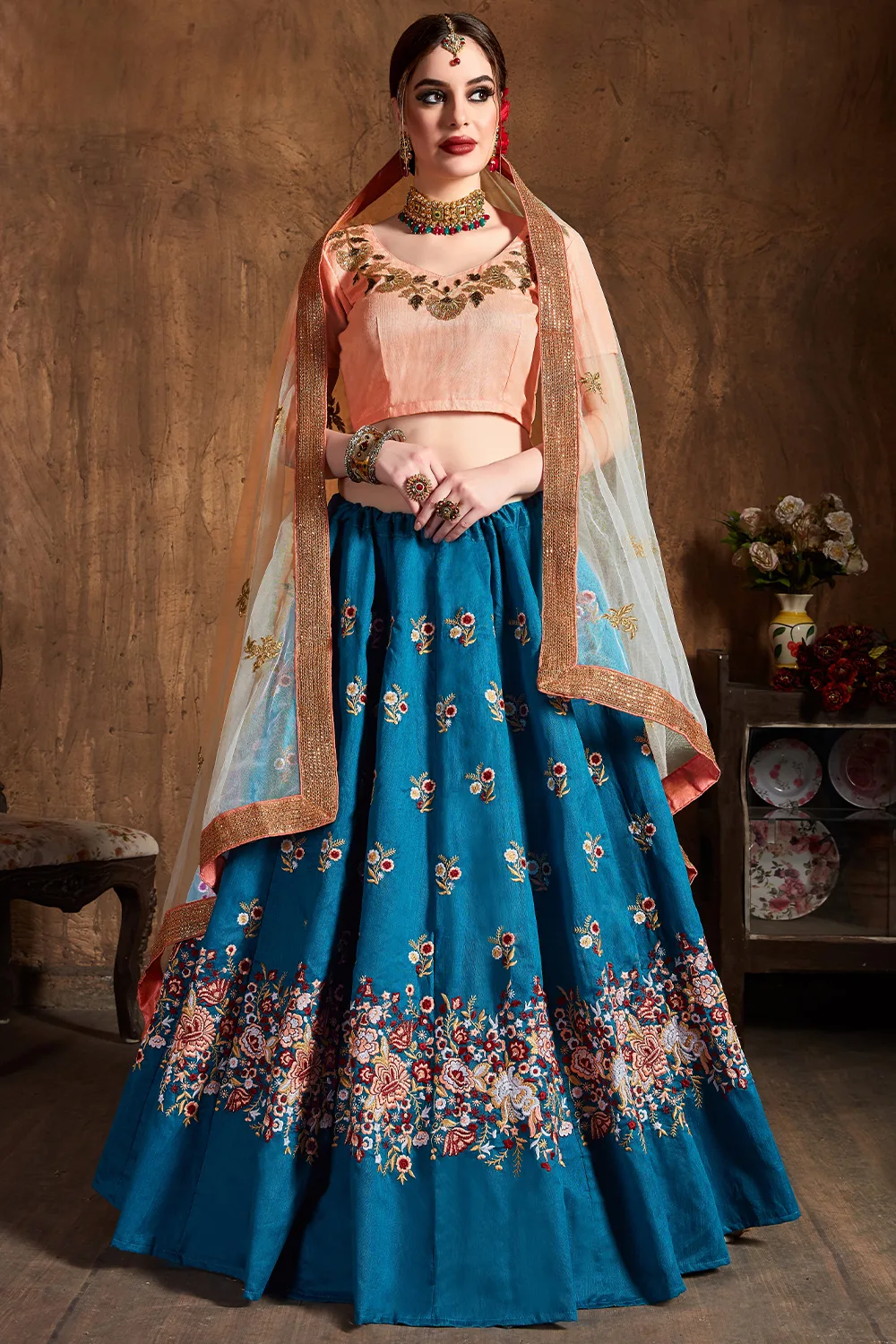 Gorgeous Teal Blue Raw Silk Lehenga Choli with Intricate Soft Net Dupatta Gorgeous Teal Blue Raw Silk Lehenga Choli with Intricate Soft Net Dupatta