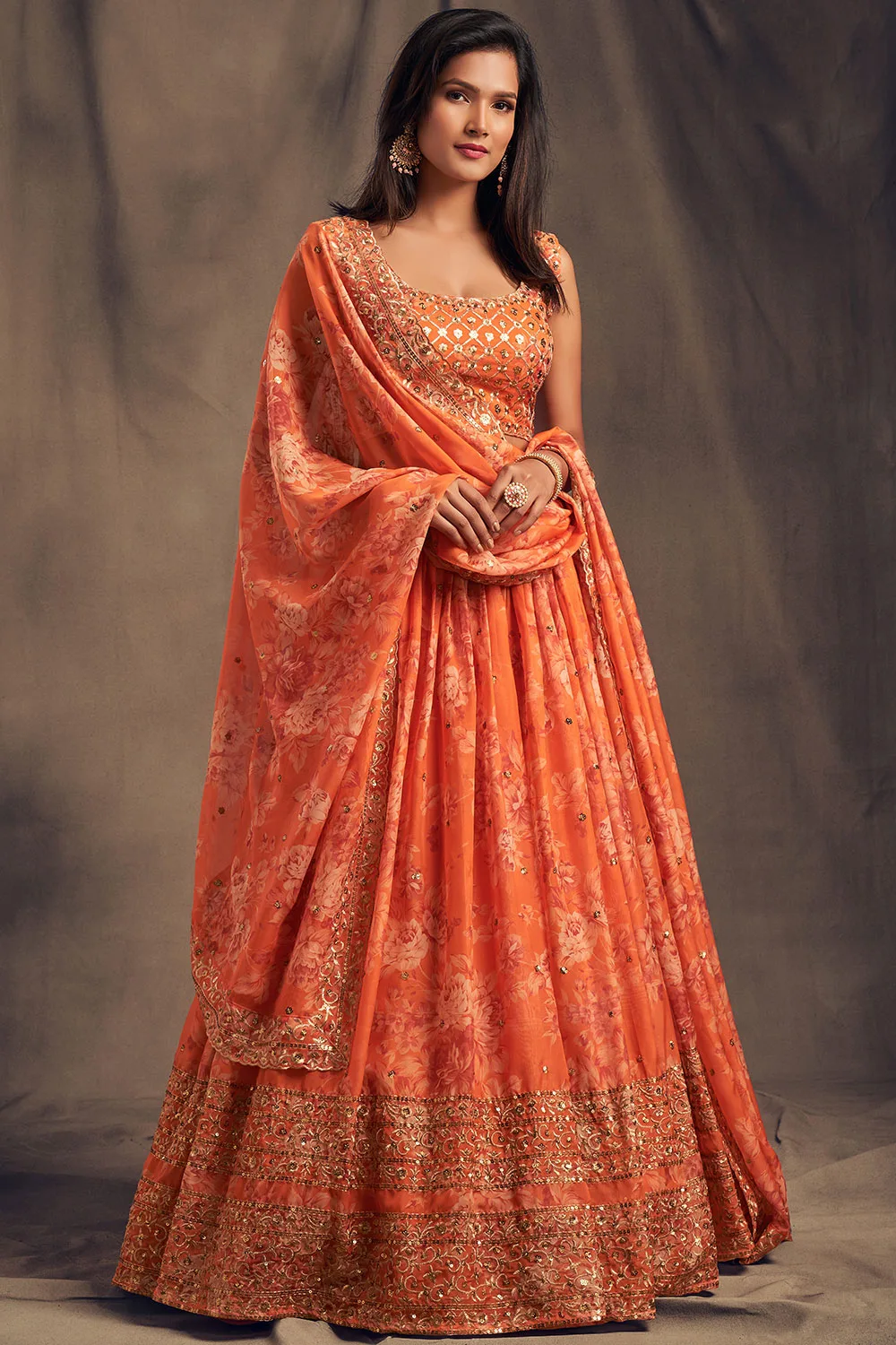 Radiant Orange Floral Organza Lehenga Choli Set with Sequins Zari Embroidery Radiant Orange Floral Organza Lehenga Choli Set with Sequins Zari Embroidery