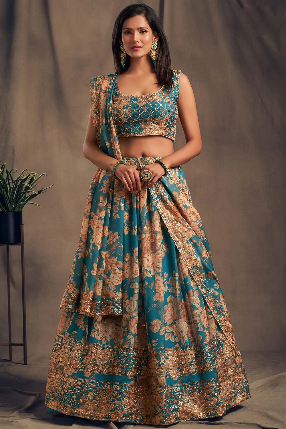 Exquisite Teal Floral Organza Lehenga Choli Set with Sequins Zari Embroidery Exquisite Teal Floral Organza Lehenga Choli Set with Sequins Zari Embroidery