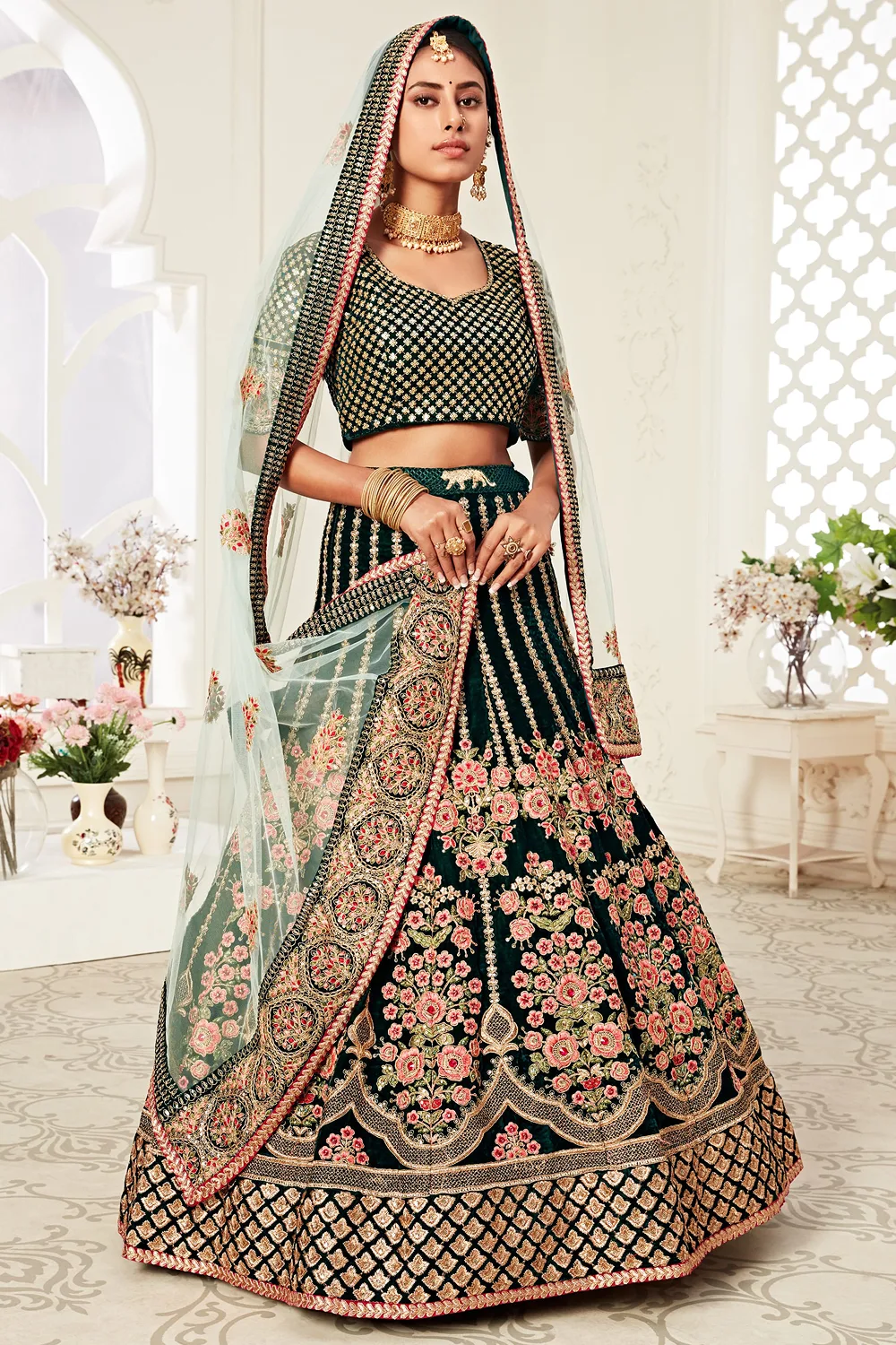Green Velvet Bridal Lehenga Choli with Embroidery and Sequins Detailing Green Velvet Bridal Lehenga Choli with Embroidery and Sequins Detailing