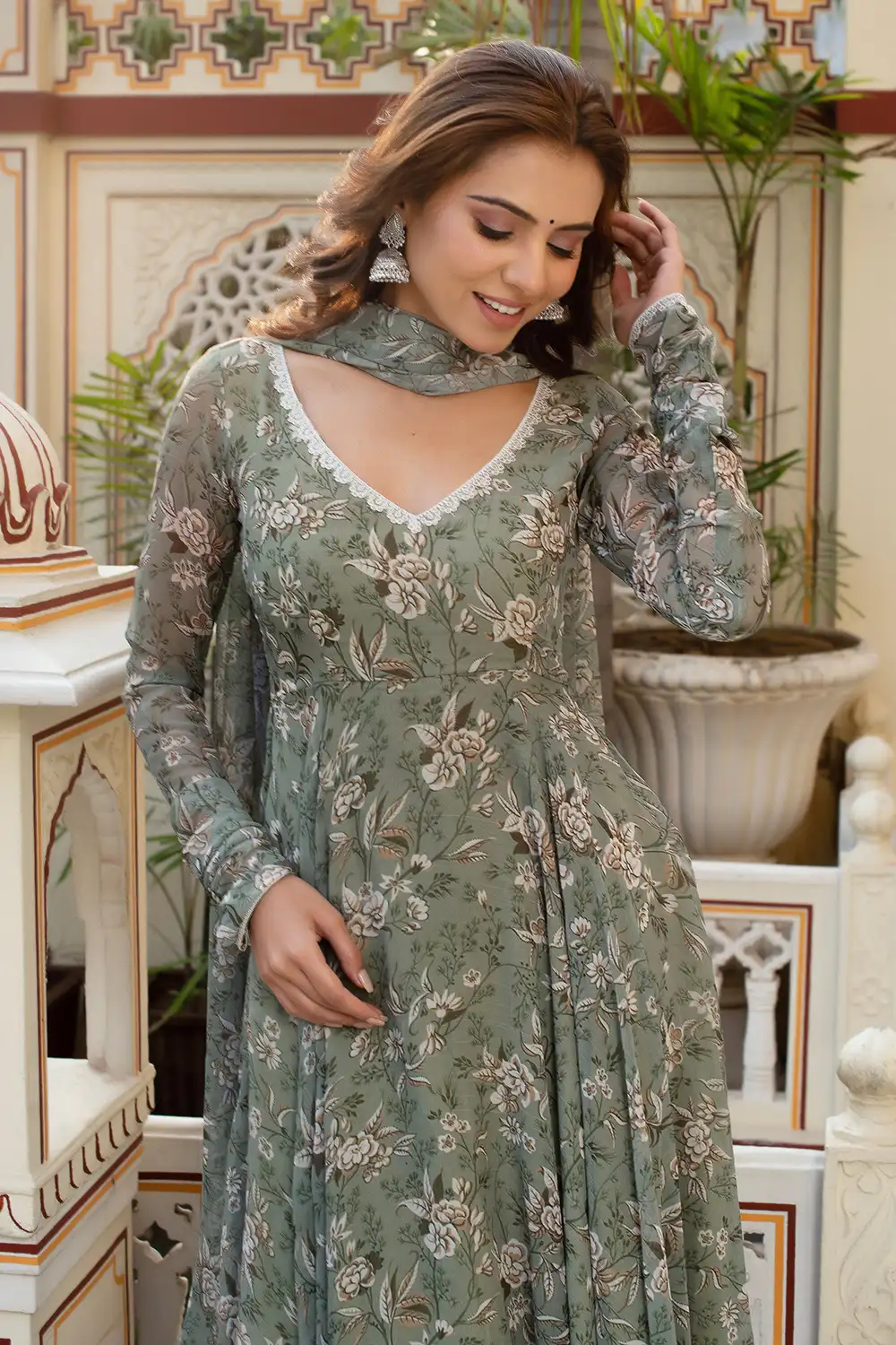 Close-up of Bandhni Printing on Dusty Green Gown