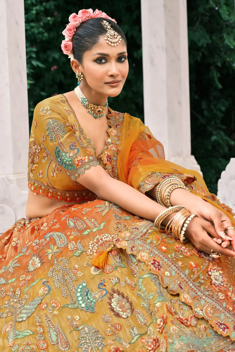 Close-up of Stone and Sequence Work on Orange Silk Lehenga
