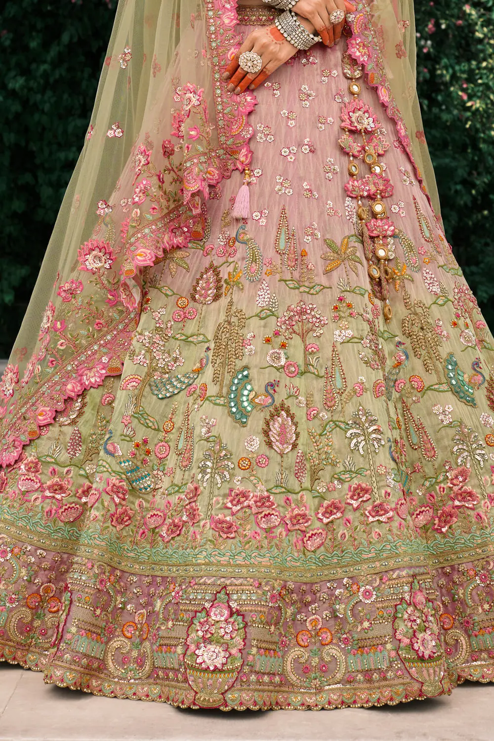 Pink lehenga choli worn by model for bridal inspiration