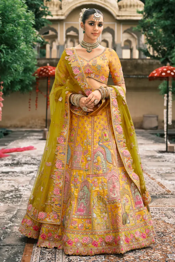 Yellow lehenga choli modeled for haldi ceremony inspiration