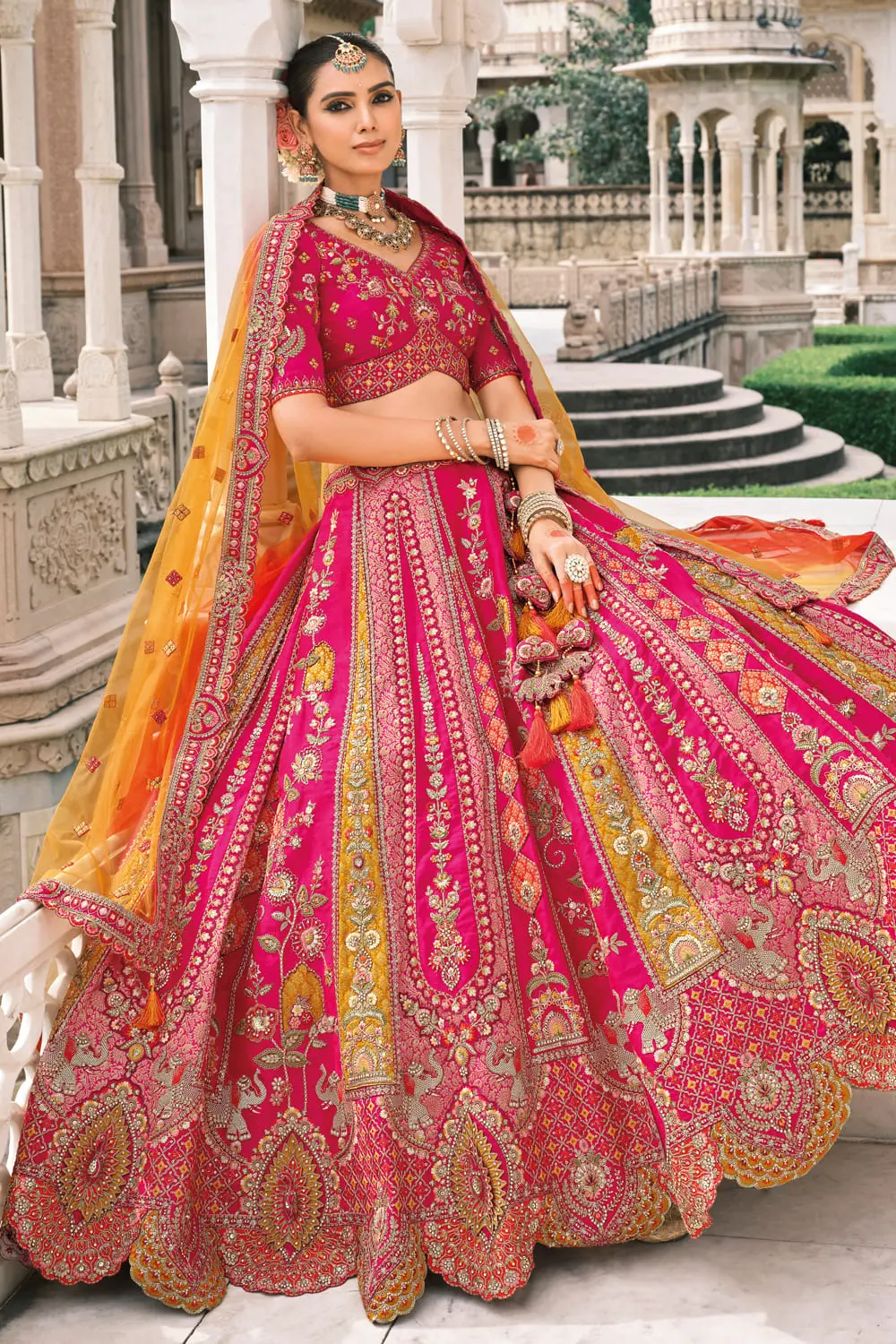 Complete pink lehenga choli set modeled for bridal inspiration
