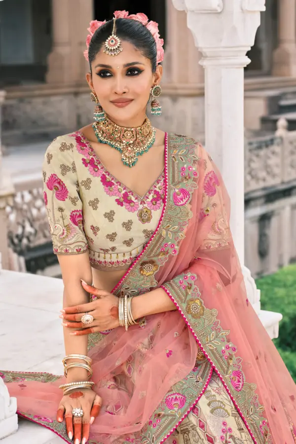 Close-up of stone and mirror work on ivory bridal lehenga