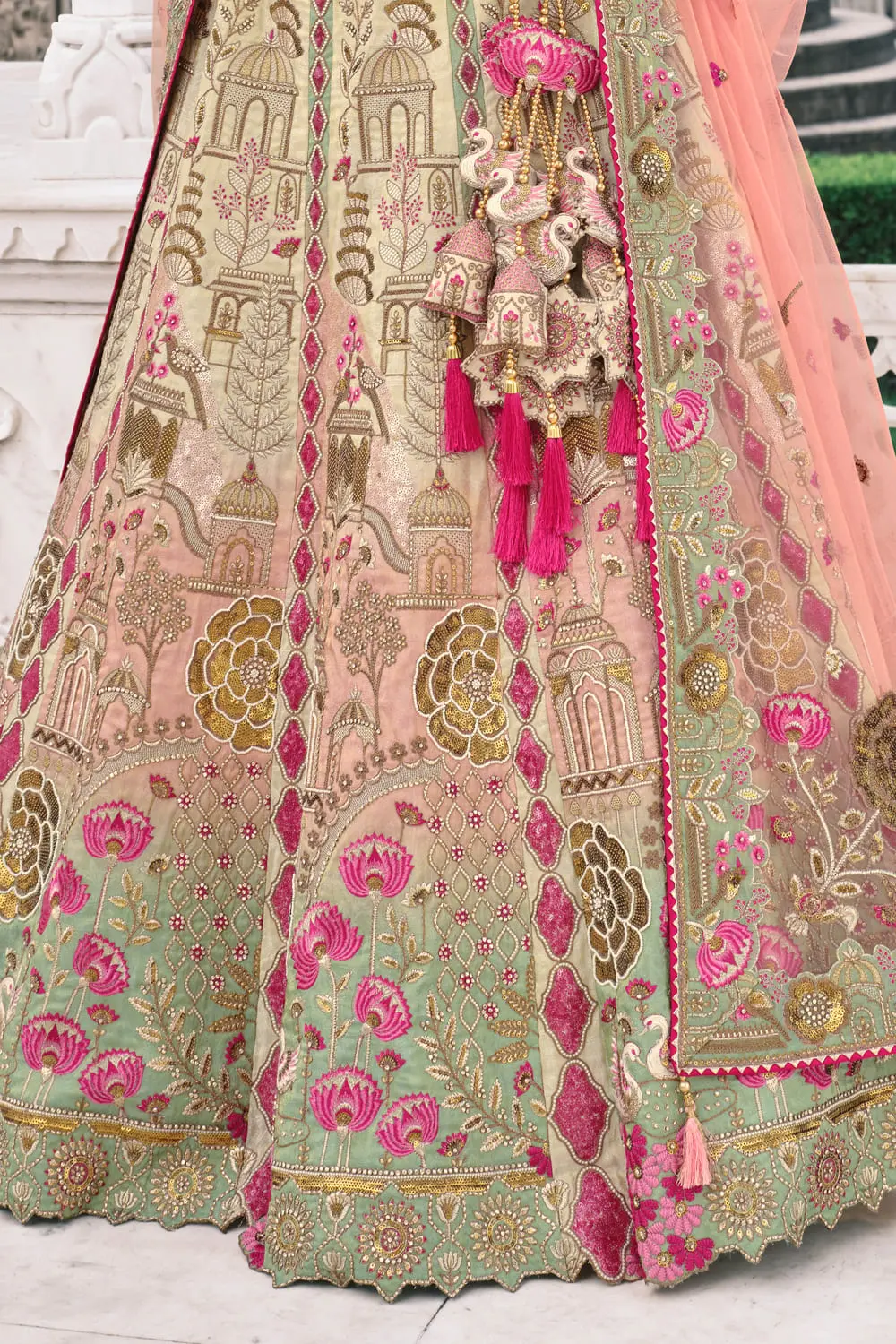 Ivory and pink lehenga modeled for wedding ceremony inspiration