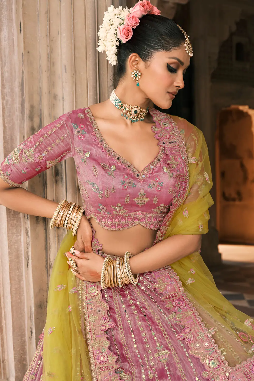 Flat lay of the dark pink chaniya choli set, highlighting the blouse and dupatta detailing.