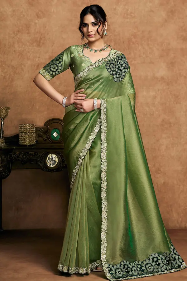 Front view of Moss Green Organza Silk Saree showcasing pearl and sequin embellishments