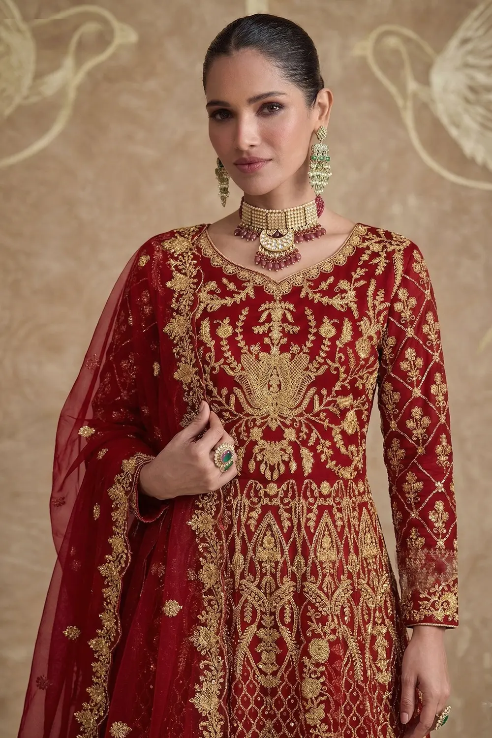 Close up detail of the intricate coding and embroidery on the Red Silk Anarkali Gown neckline.