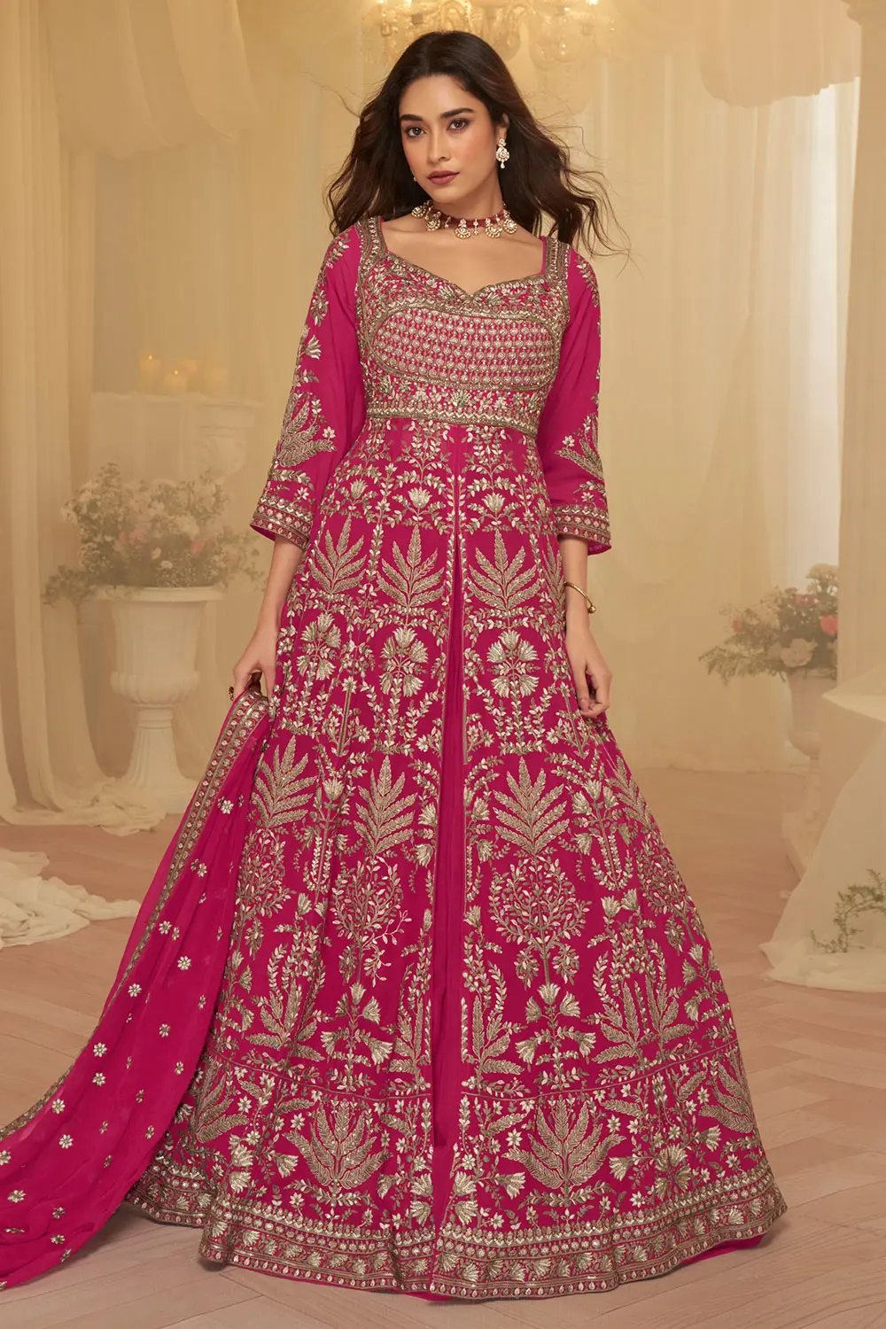 Model wearing Pink Anarkali suit for festive celebration