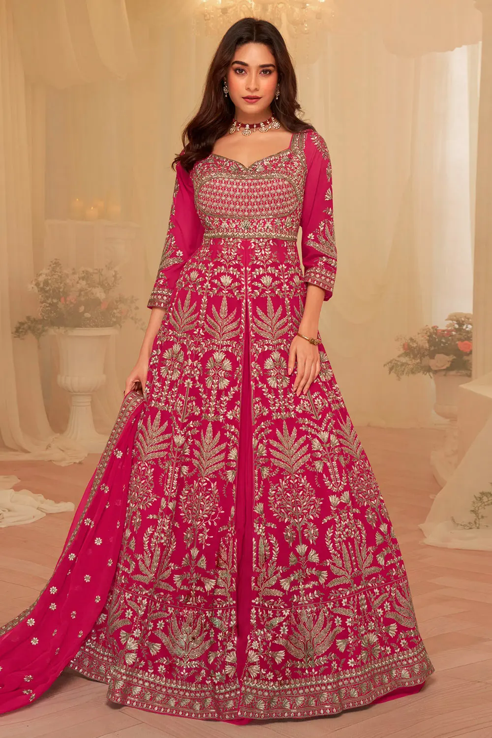 Front view of Pink Anarkali suit with heavy embroidery on georgette