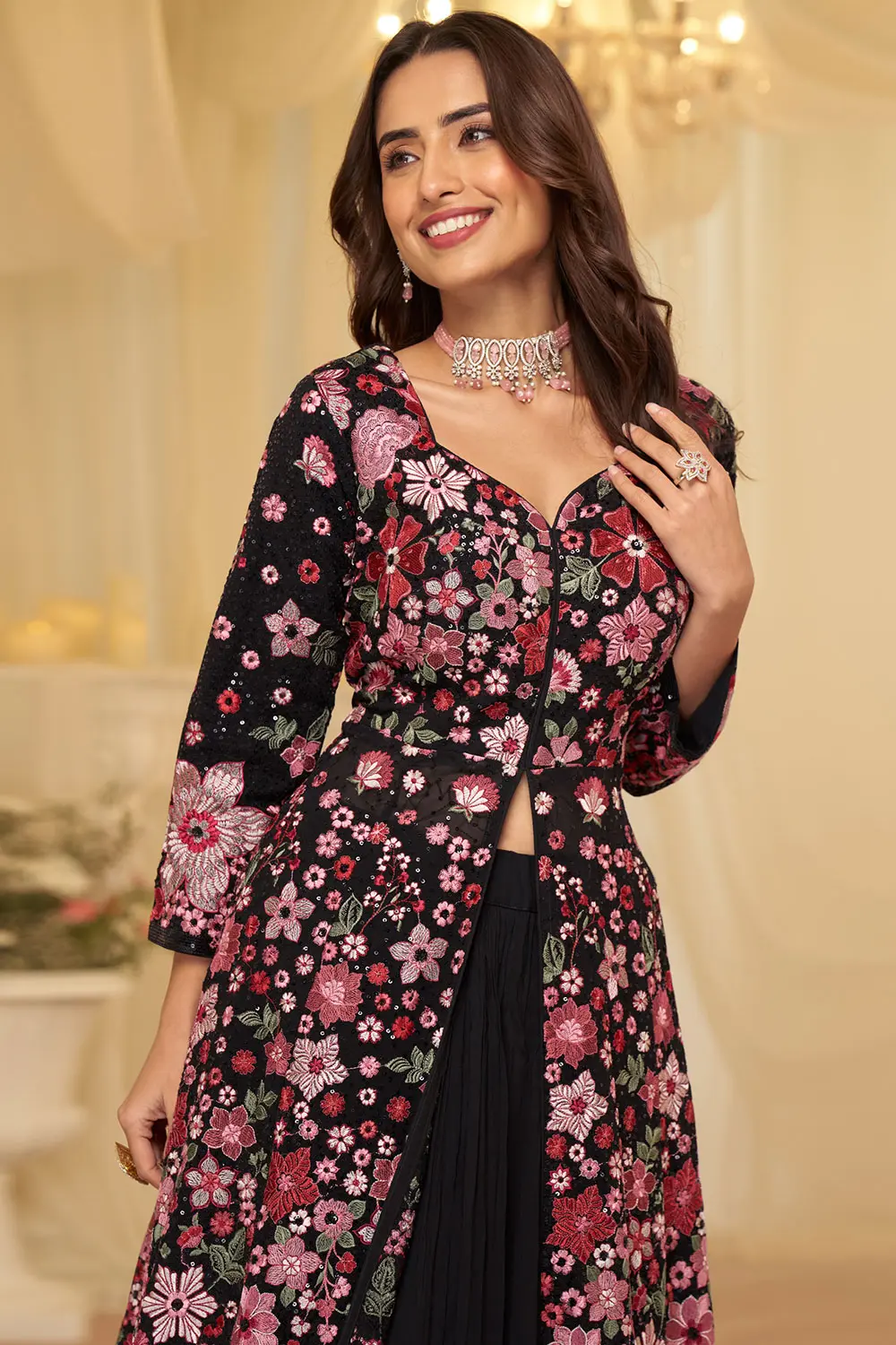 Skirt and cut top of black frock suit from Khaish