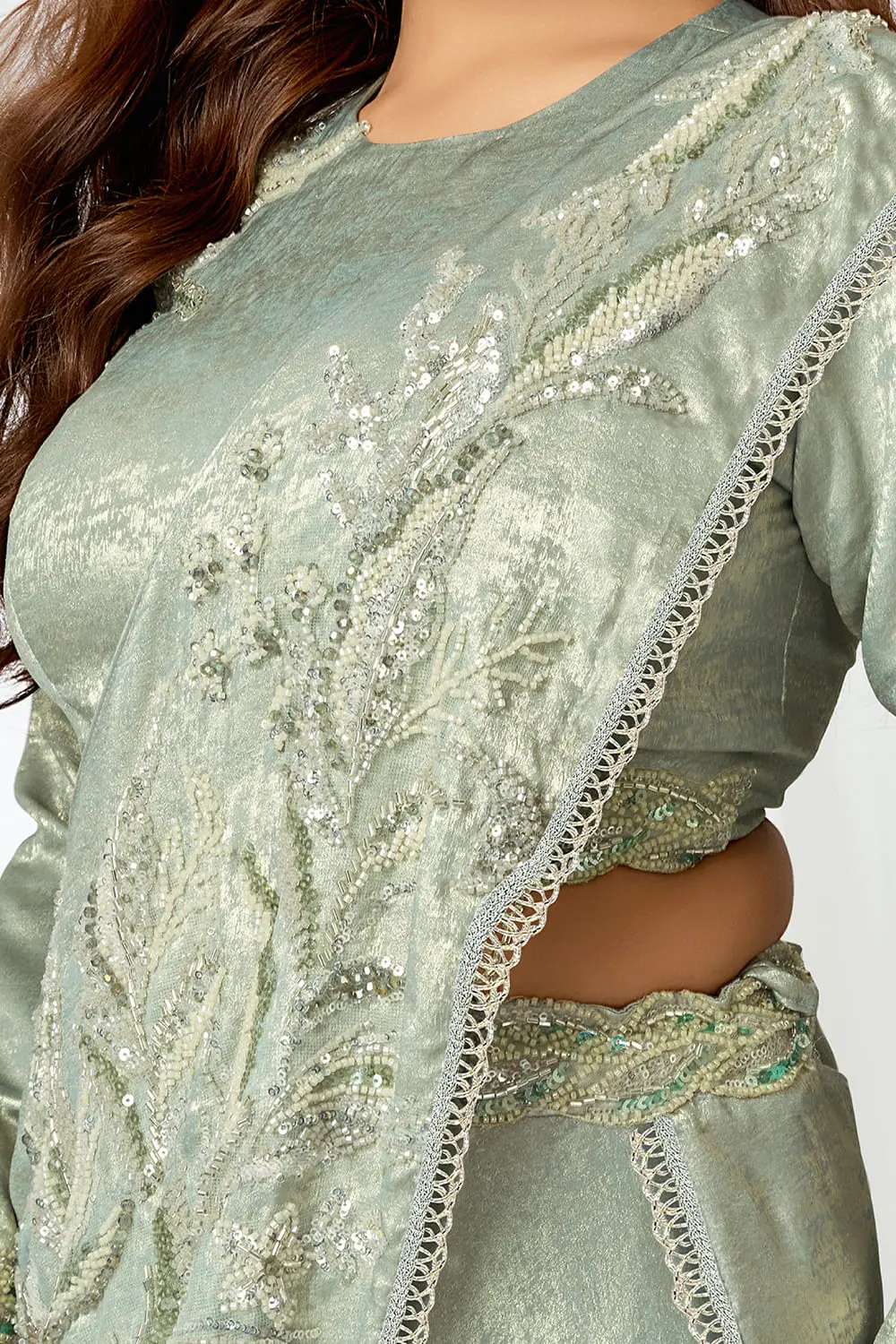 Engagement saree for bride wearing this light green saree gown design