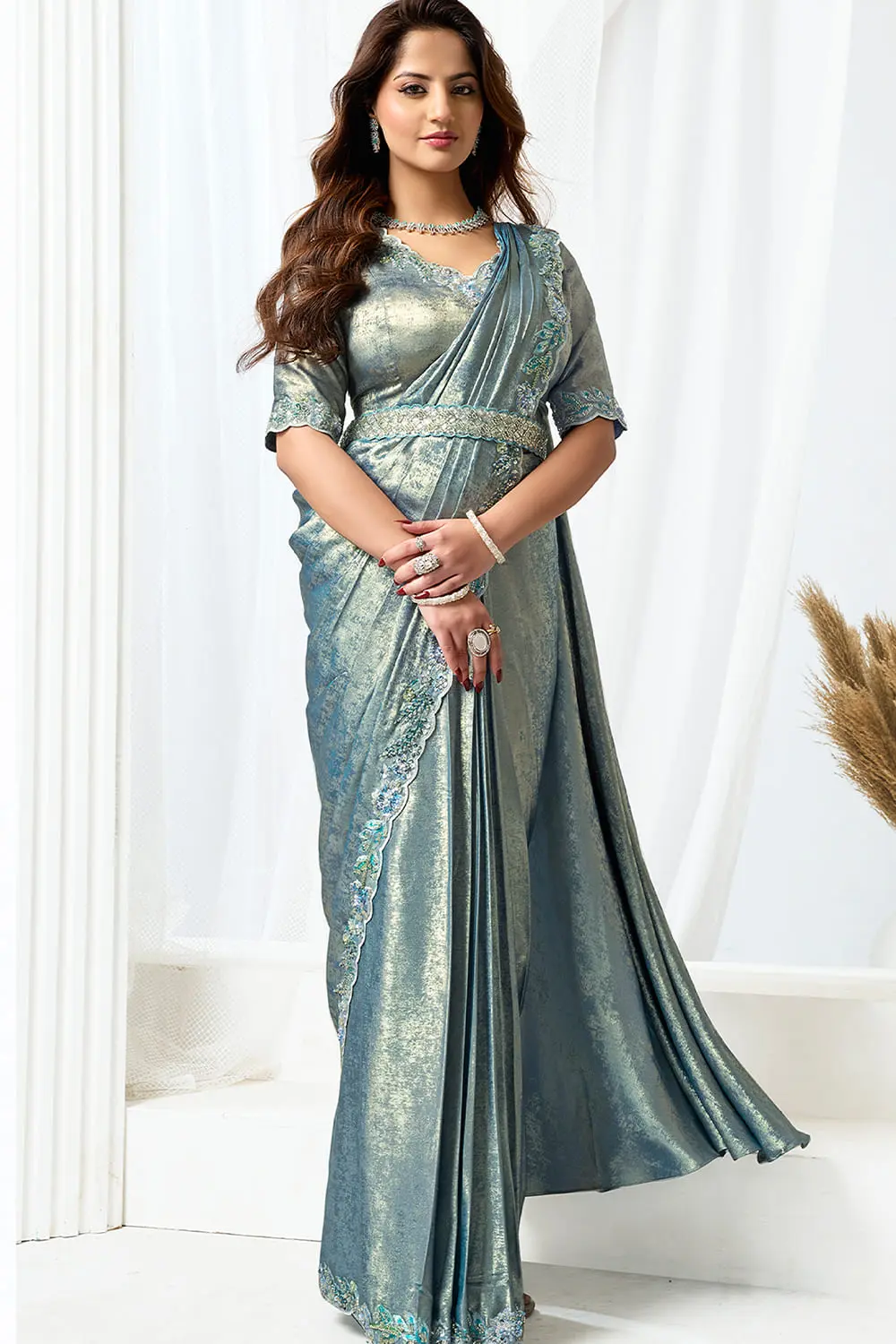 Pre stitched saree online – jacket worn open over embroidered net saree