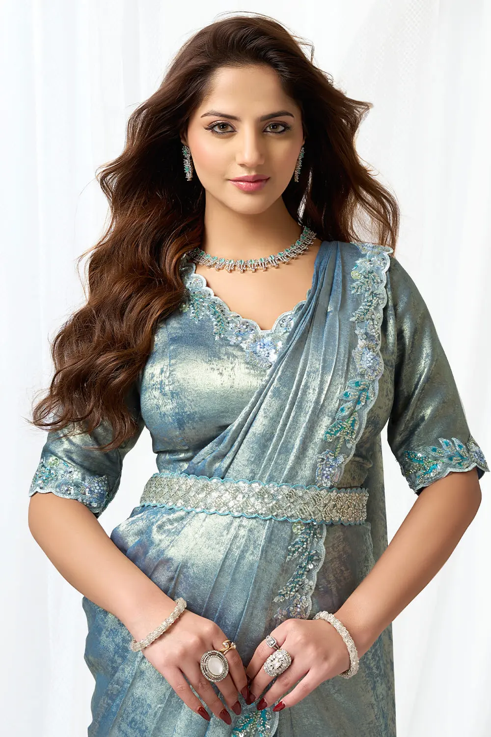 Close up of pure beads and hand work on leaf motifs of grey saree party wear