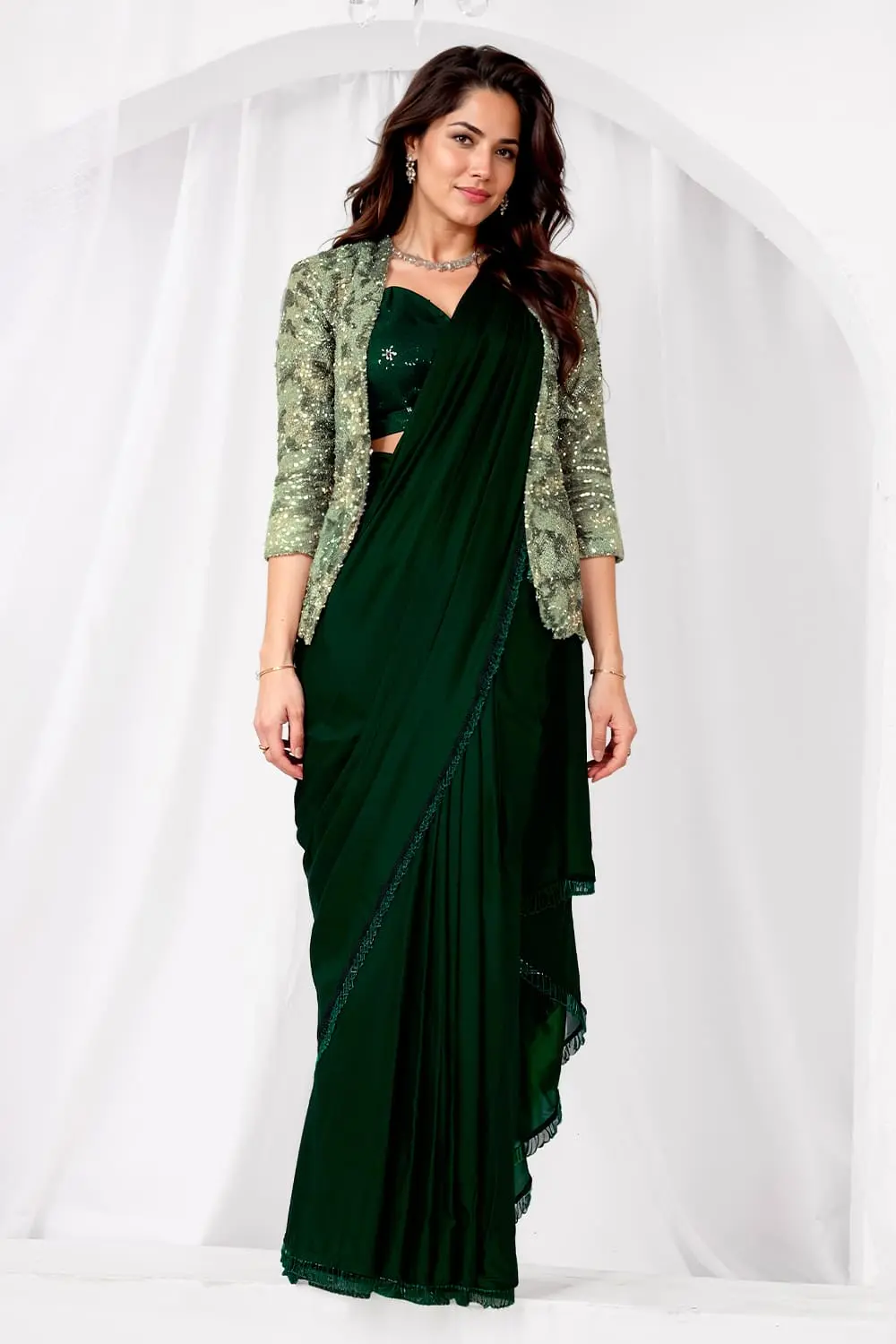 Green party wear saree front view with jacket closed showing satin silk shine and sequin embroidery