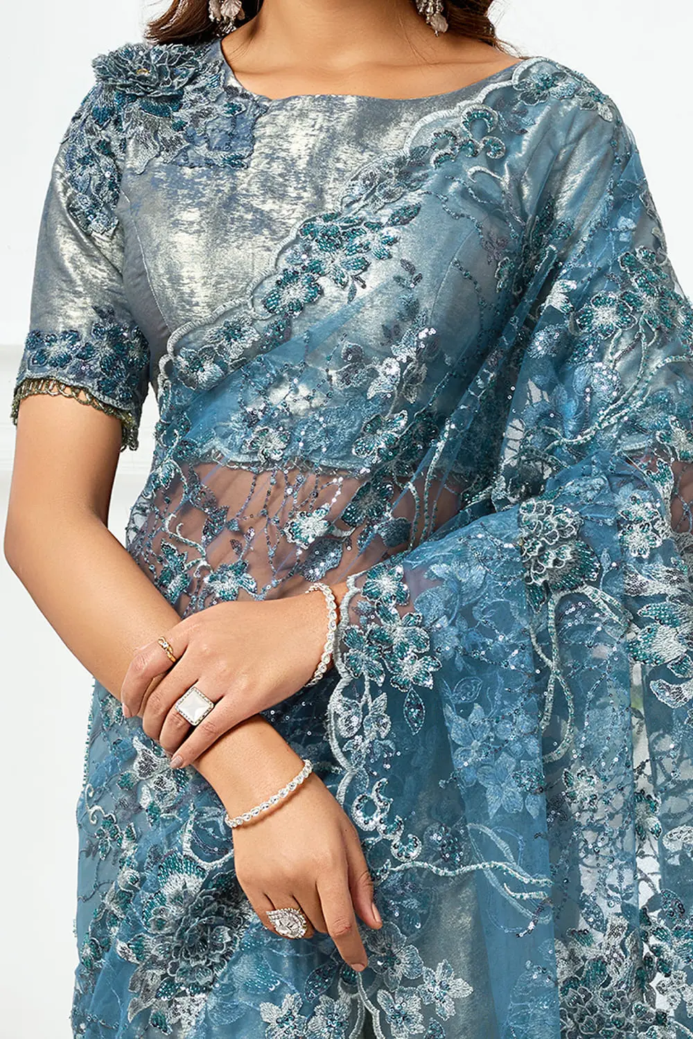 Designer saree party wear – side drape of dusty blue satin silk saree