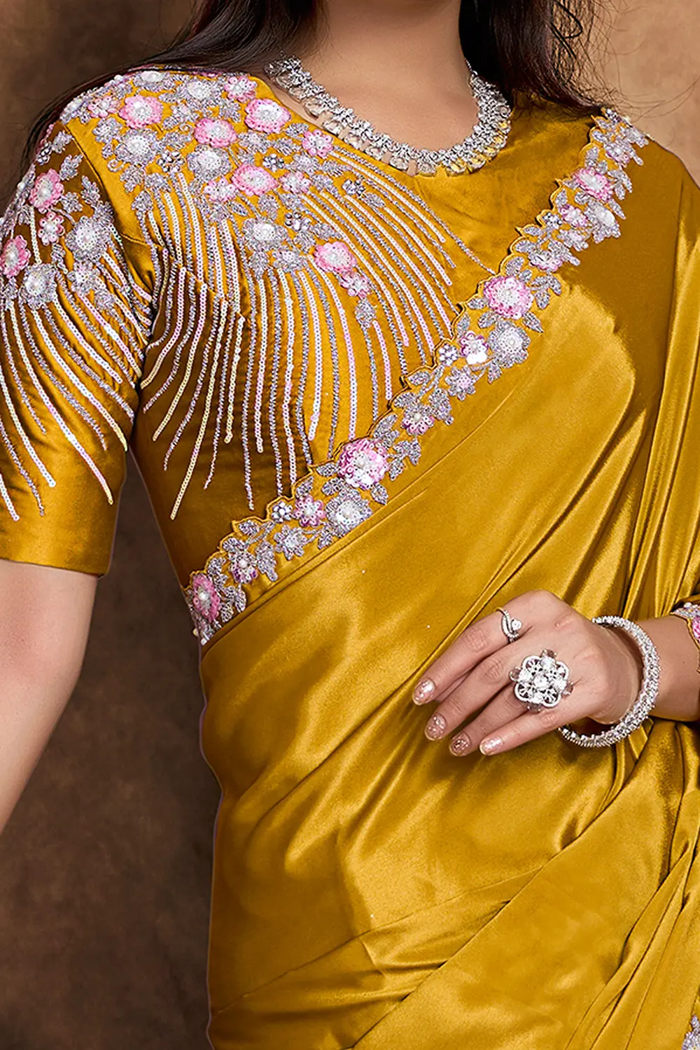 Model wearing festive mustard saree