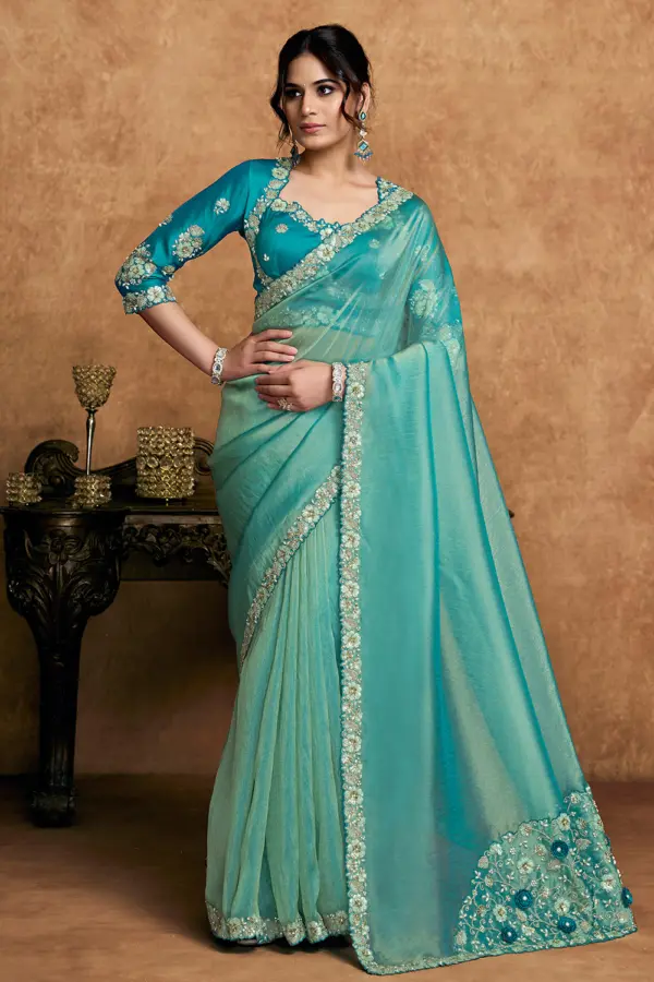 Front view of Turquoise Organza Silk Saree with sequin and pearl work