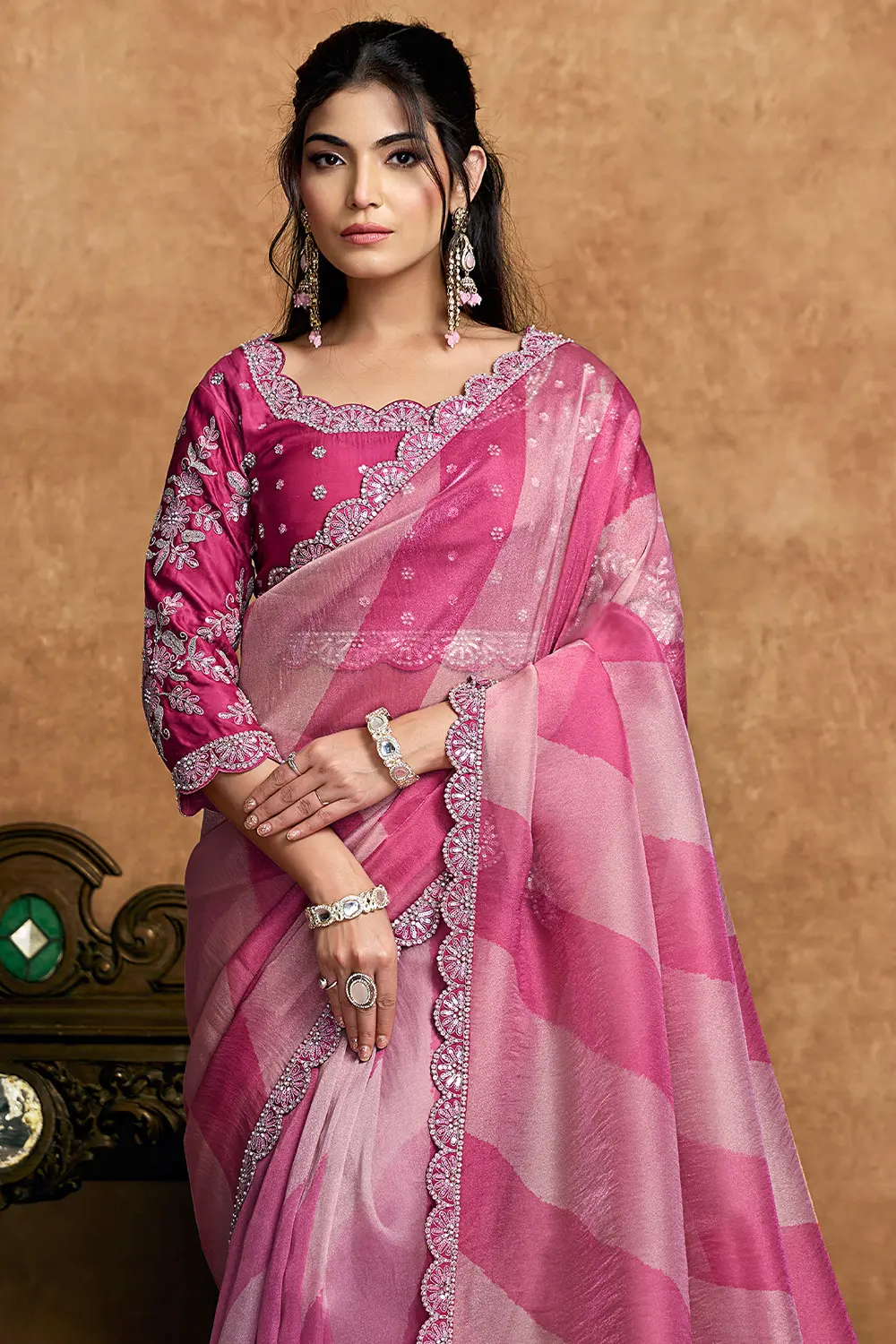 Model wearing pink festive saree