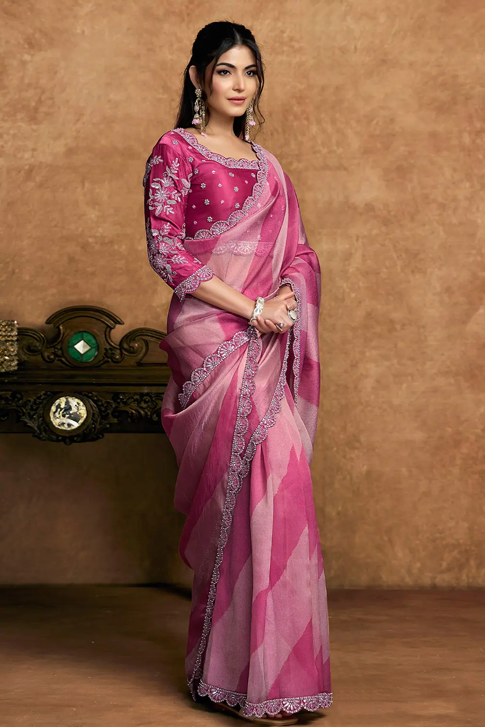 Draped shimmer saree showcasing flowy texture
