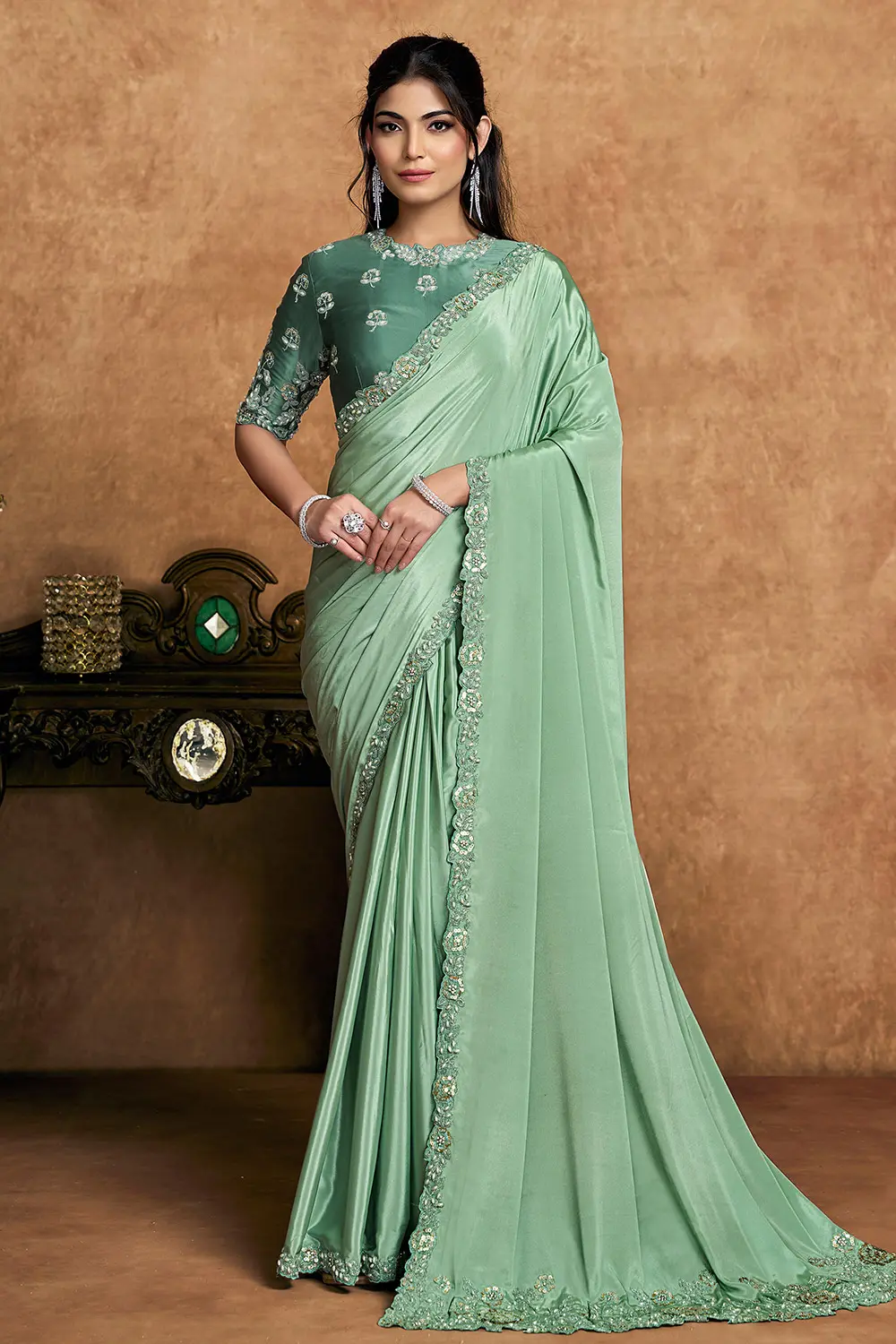 Mint Green Satin Silk Saree with Floral Sequin & Pearl Detailing Mint Green Satin Silk Saree with Floral Sequin & Pearl Detailing