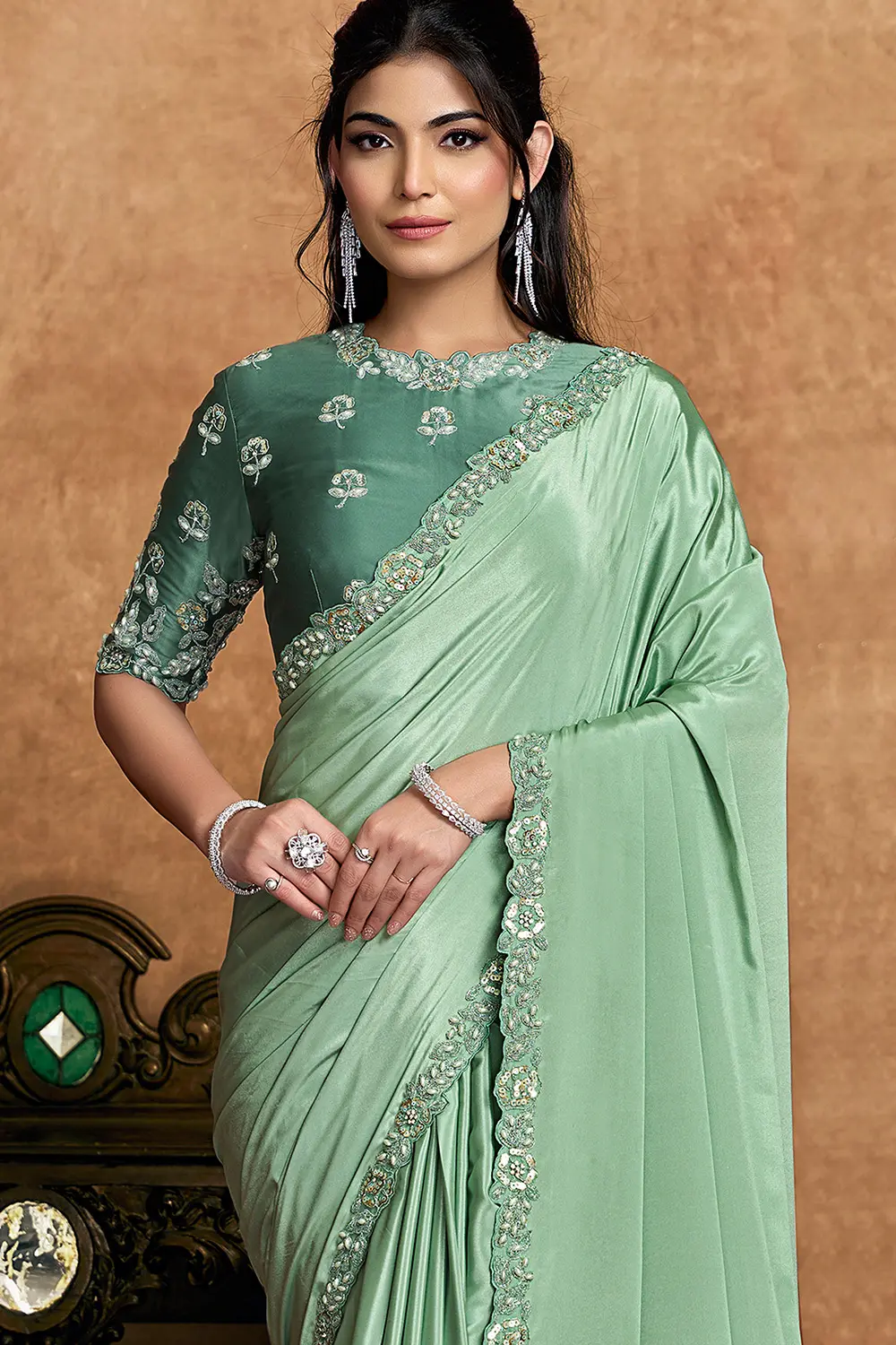 Draped satin silk saree showcasing smooth finish