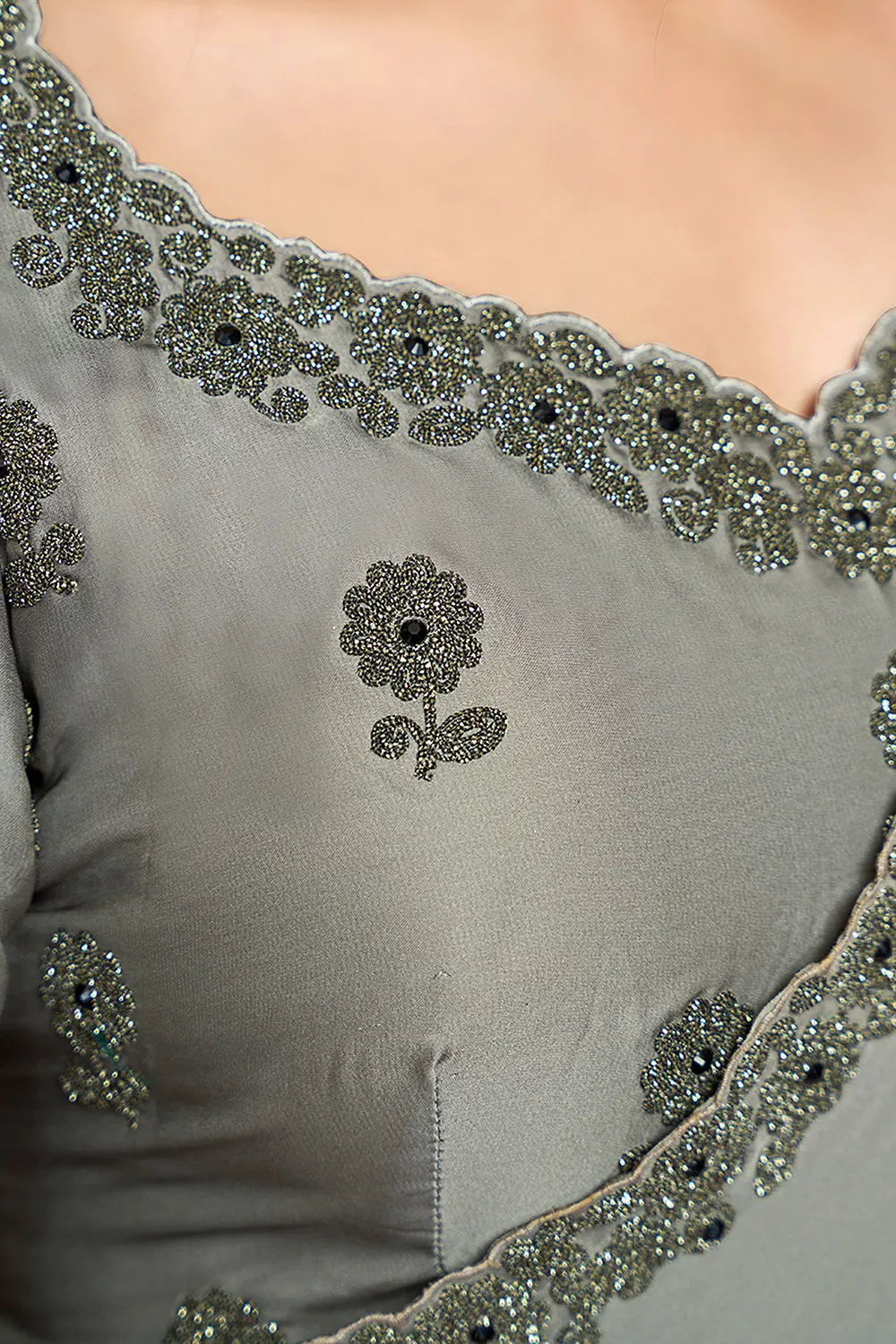 Draped satin silk saree highlighting smooth texture and shine