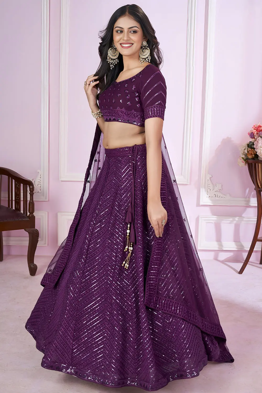 Dupatta close up featuring scattered sequins and thread work on soft net fabric