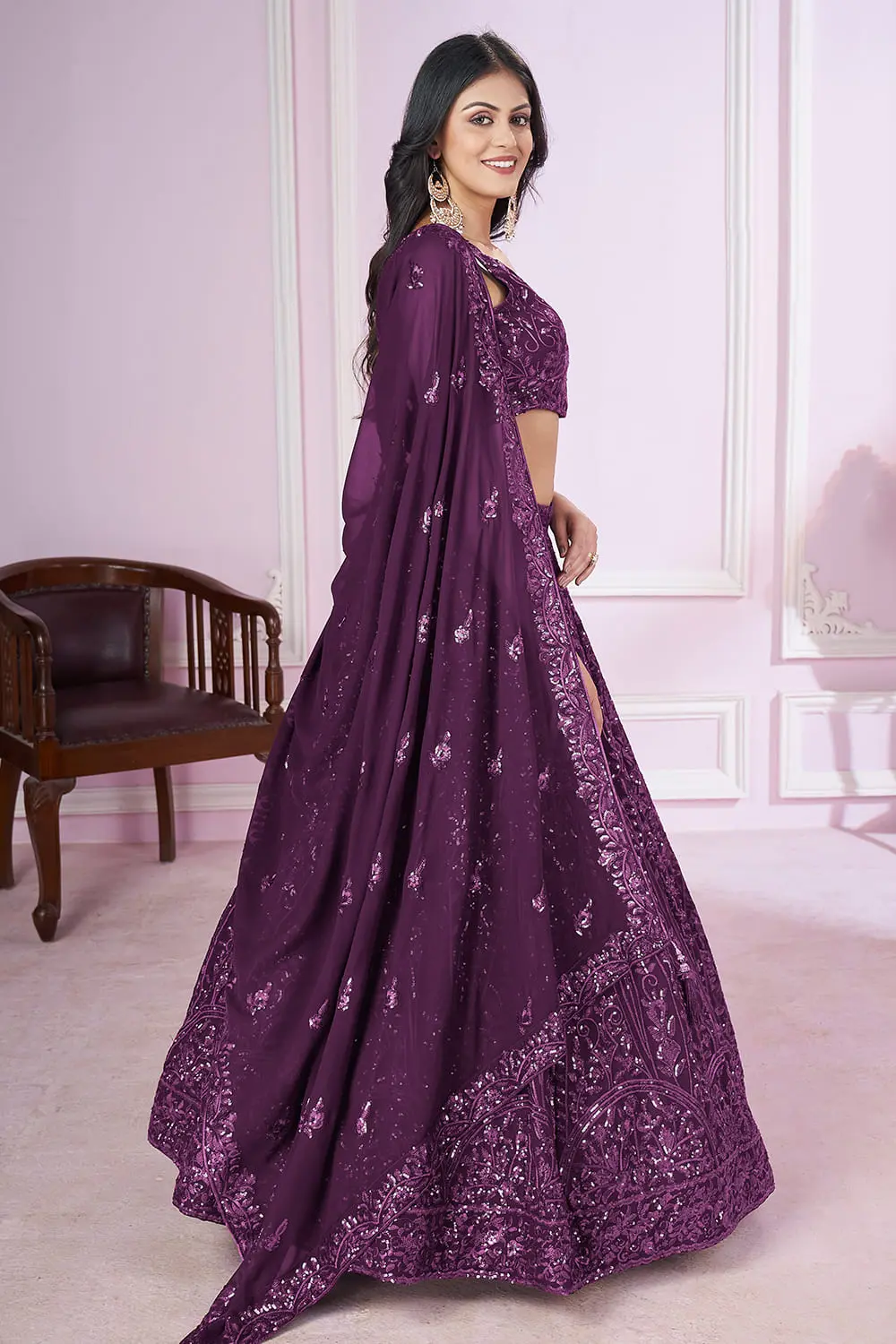 Side angle of purple georgette lehenga dress with matching georgette dupatta drape