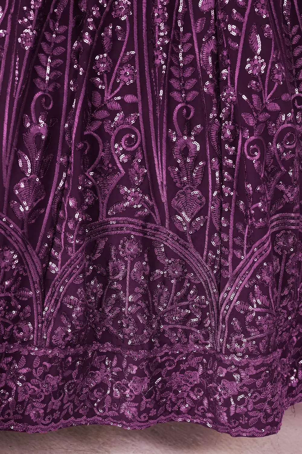 Georgette fabric texture close up of this purple lehenga dress ensemble