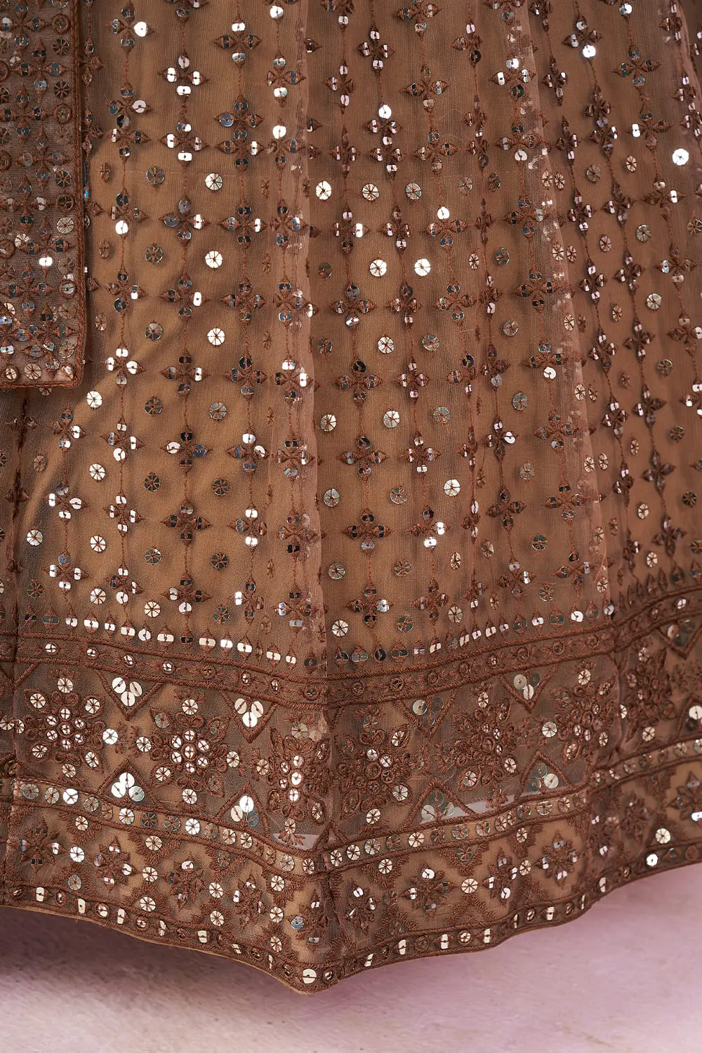Soft net fabric texture close up of this Brown Lehengas ensemble