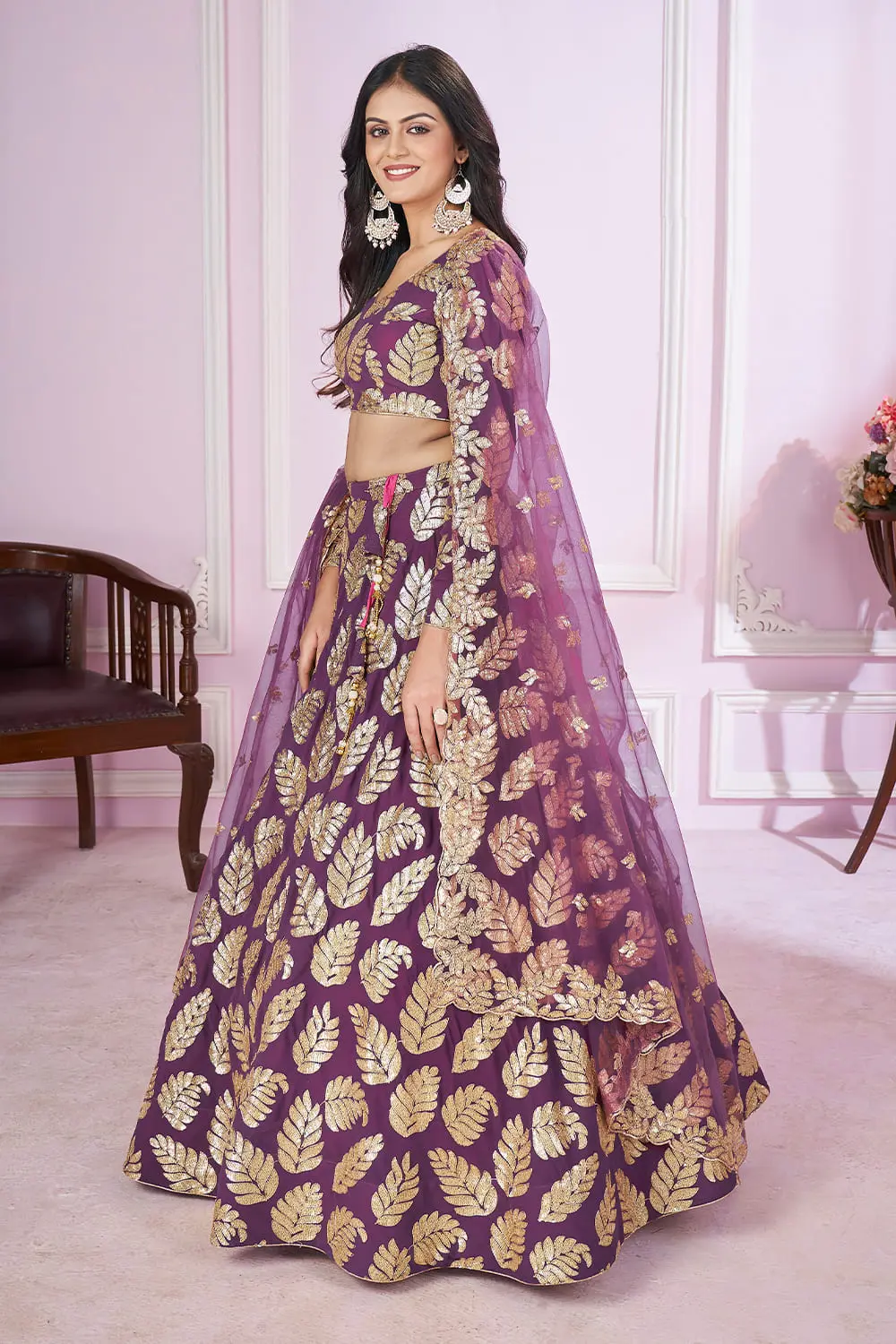 Side angle of purple georgette chaniya choli with soft net dupatta floral drape