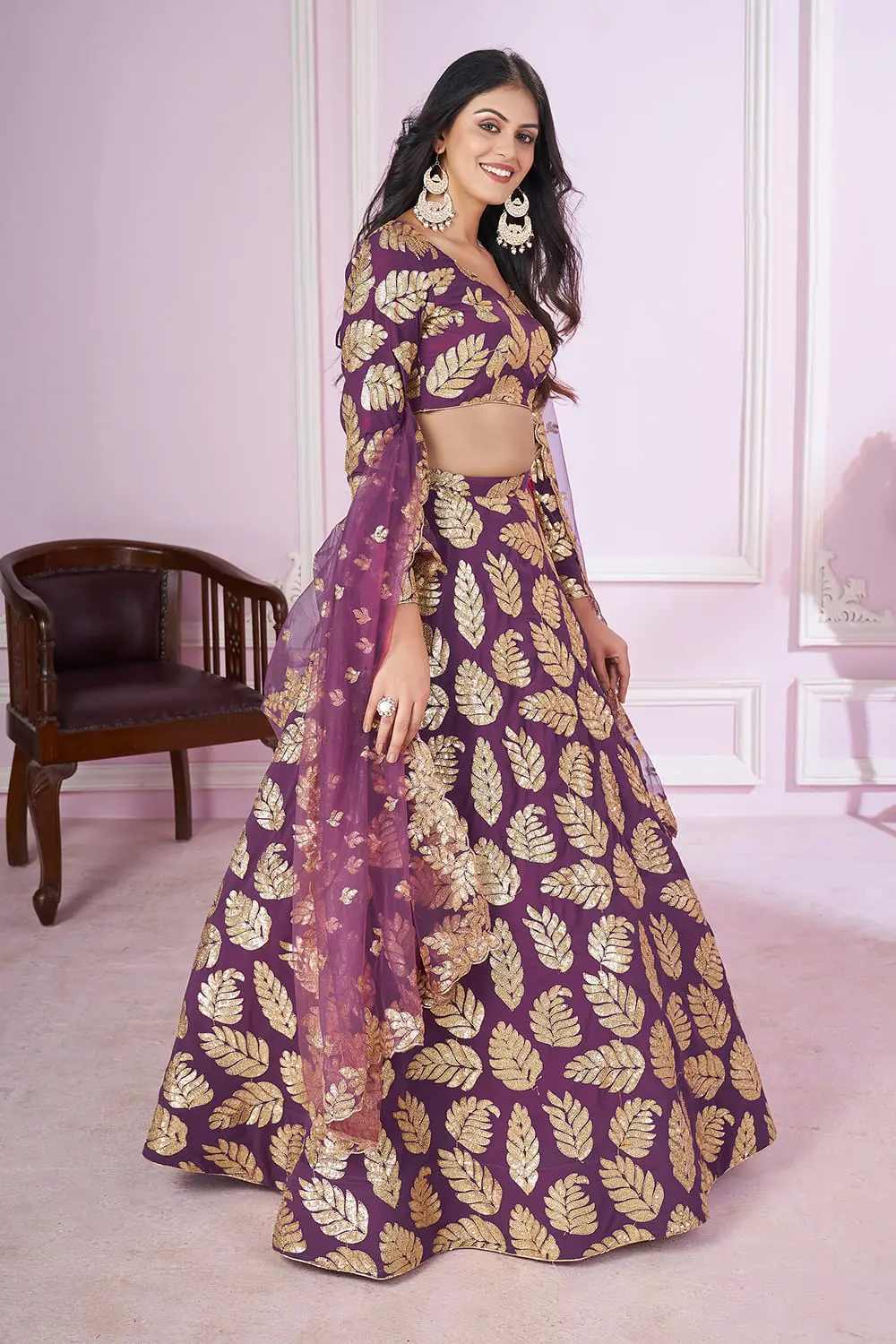 Soft net dupatta close up featuring scattered sequin flowers and zari leaves