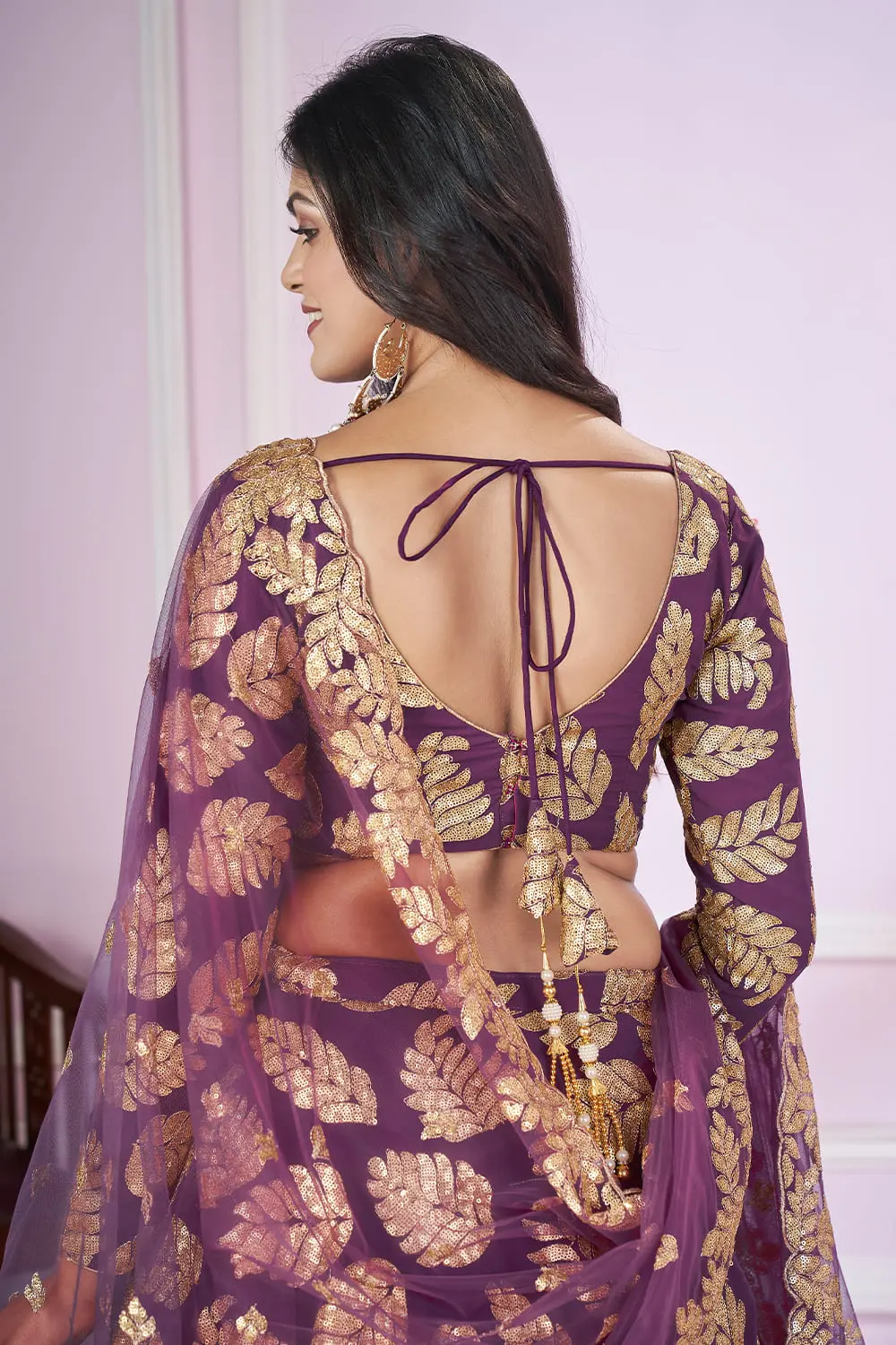 Model wearing Purple Floral Lehenga as bridal lehenga for mehendi at Khaish studio