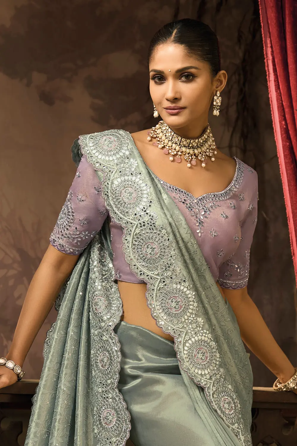 Close-up of moti and mirror work on Grey Sarees online