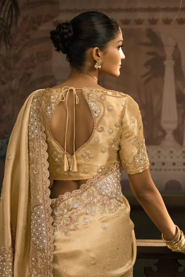Back side of gold banarasi silk saree showcasing cut-dana clusters