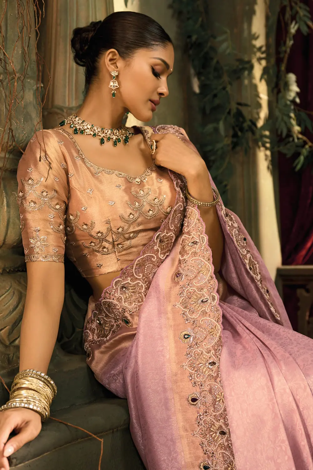 Back side detail of cut-dana and moti clusters on pink saree