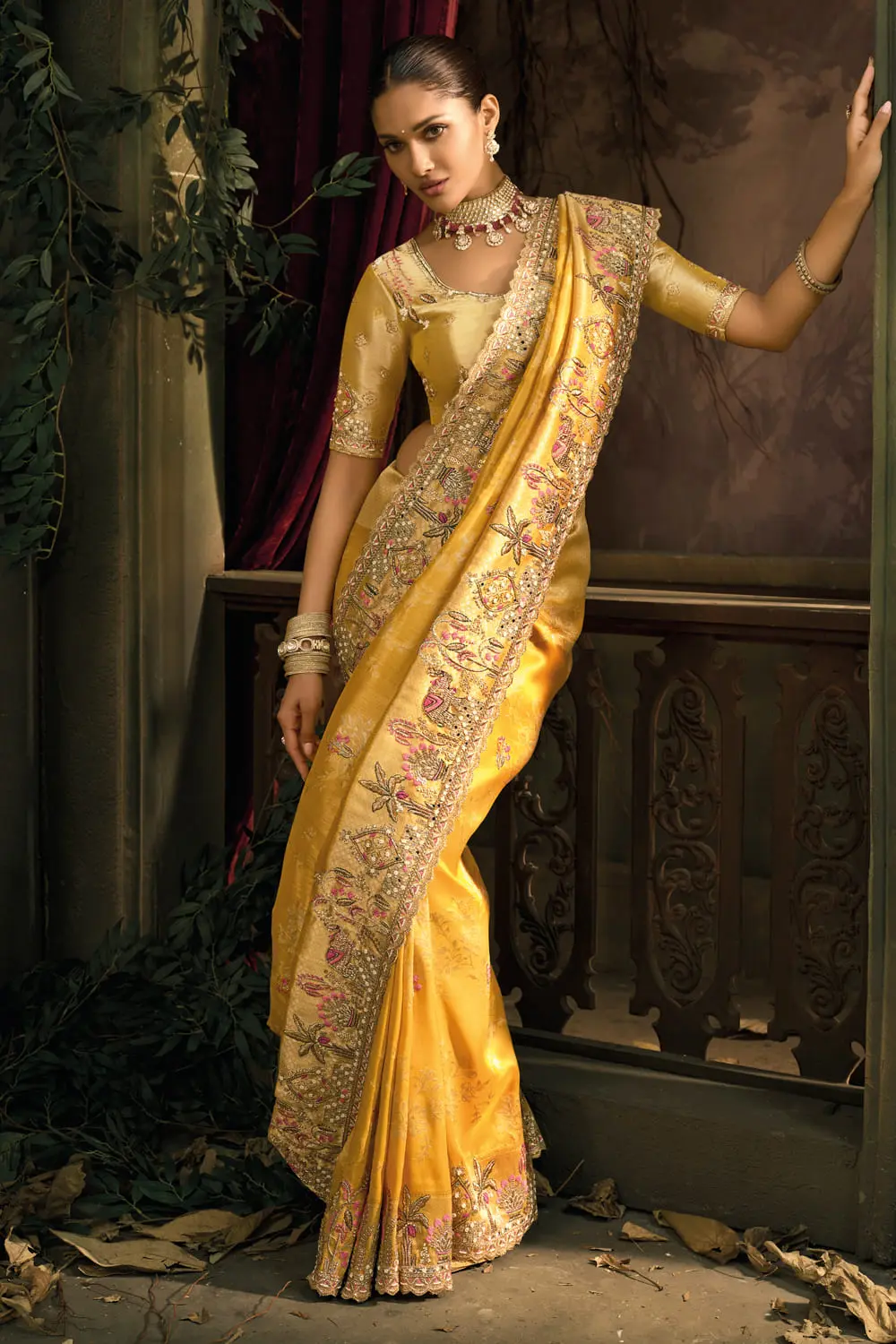 Mustard Pure Silk Saree folded showing heavy jari and cut-dana clusters