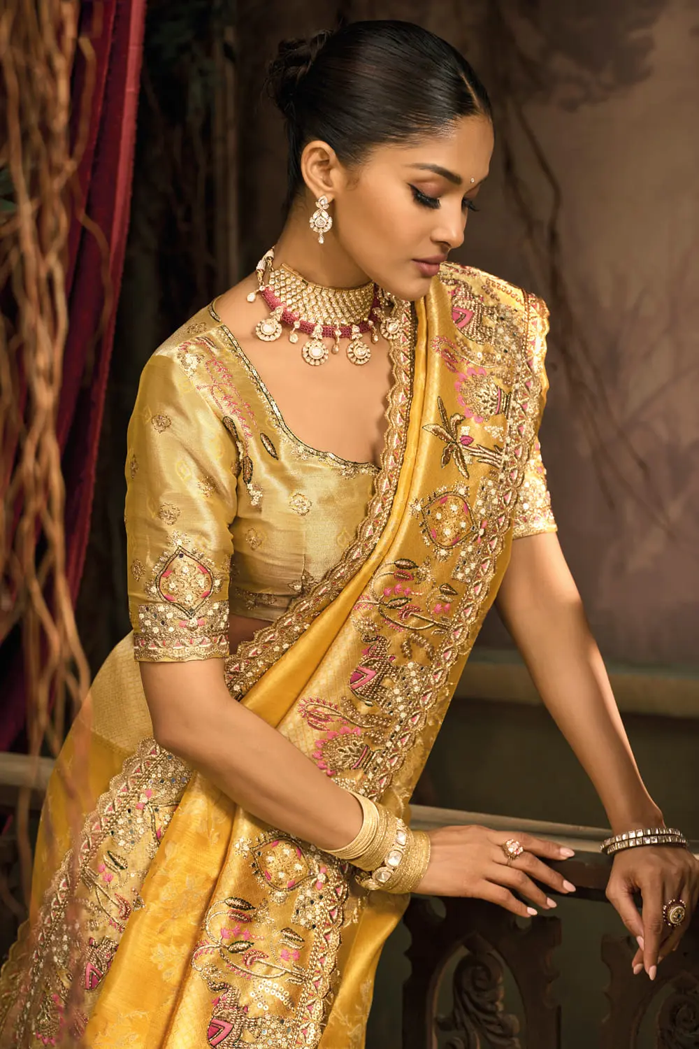Close-up of cut-dana and moti on Mustard Pure Silk Saree pallu