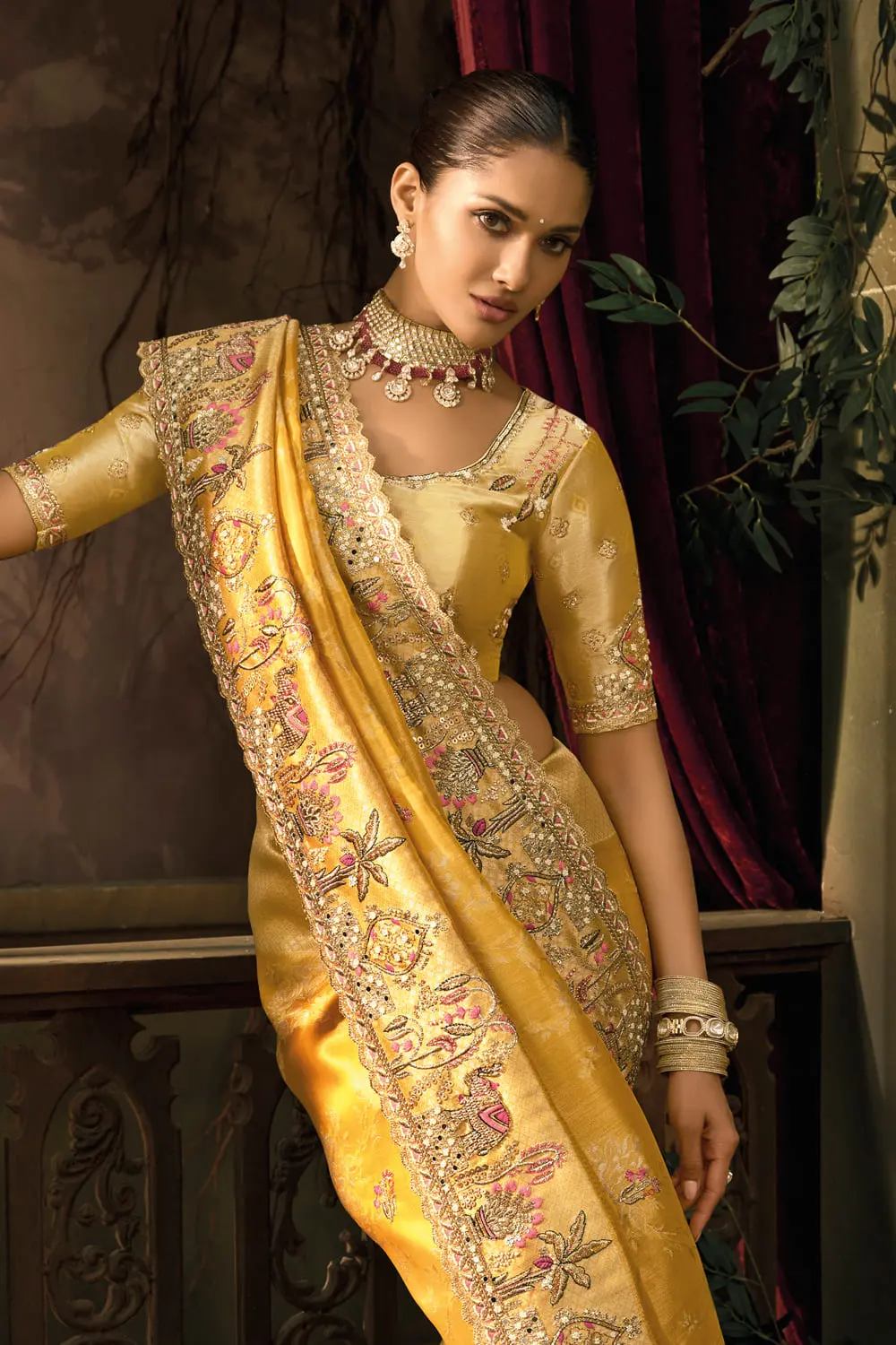 Thread embroidery detail on mustard ziraf silk saree