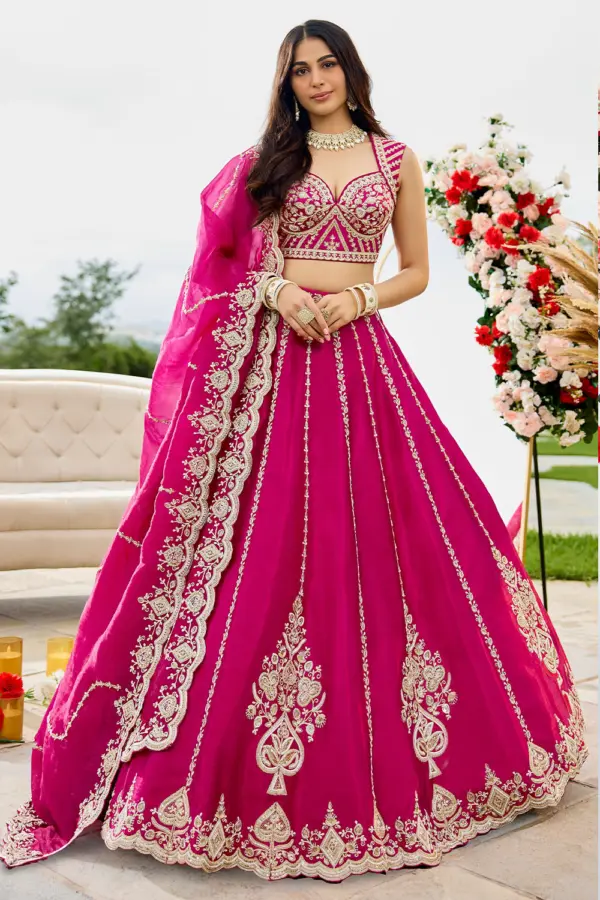 Front view of hot pink lehenga set with heavy sequin embroidery on silk fabric