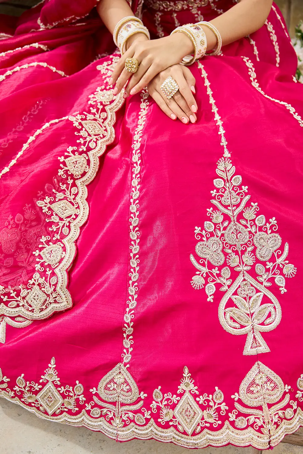 Layered inner of hot pink lehenga – double shantoon and buckram visible