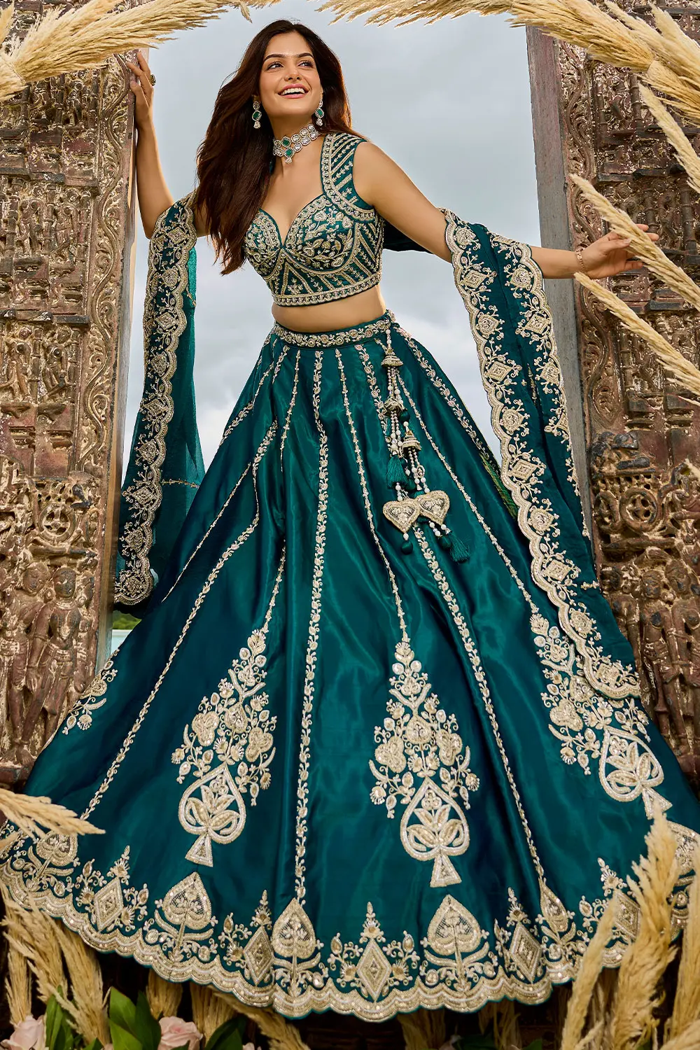 Sweetheart pattern blouse of teal blue lehenga – sequins and shantoon lining visible