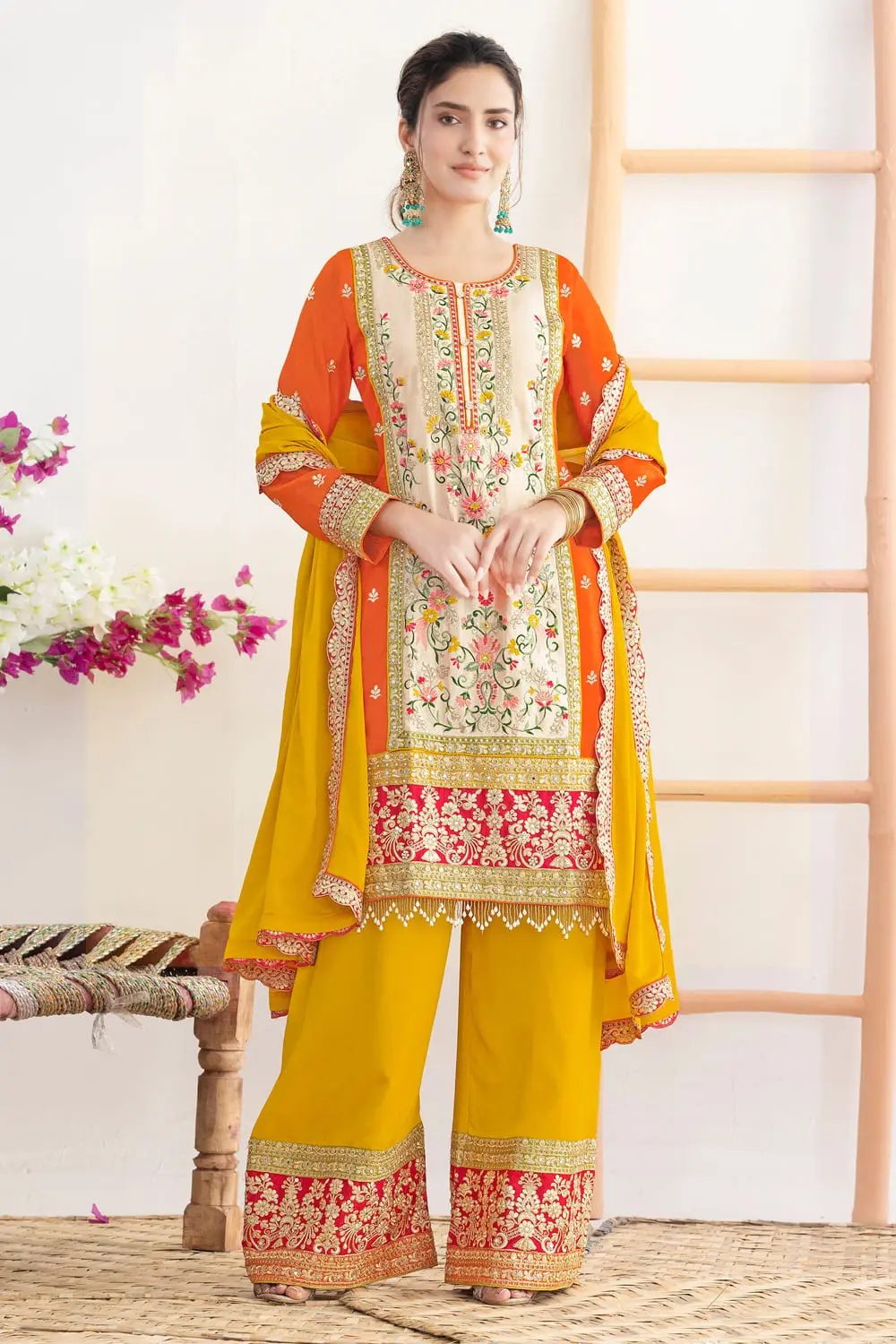 Mirror work kurta set with palazzo in orange chinon by Khaish