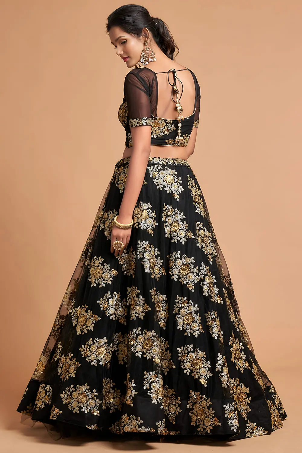 Back view of Black Soft Net Lehenga featuring a flowing soft net dupatta.