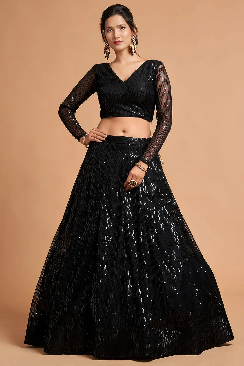 Side-angle view showing the flow of the Black Net Lehenga ghagra and the blouse back design.